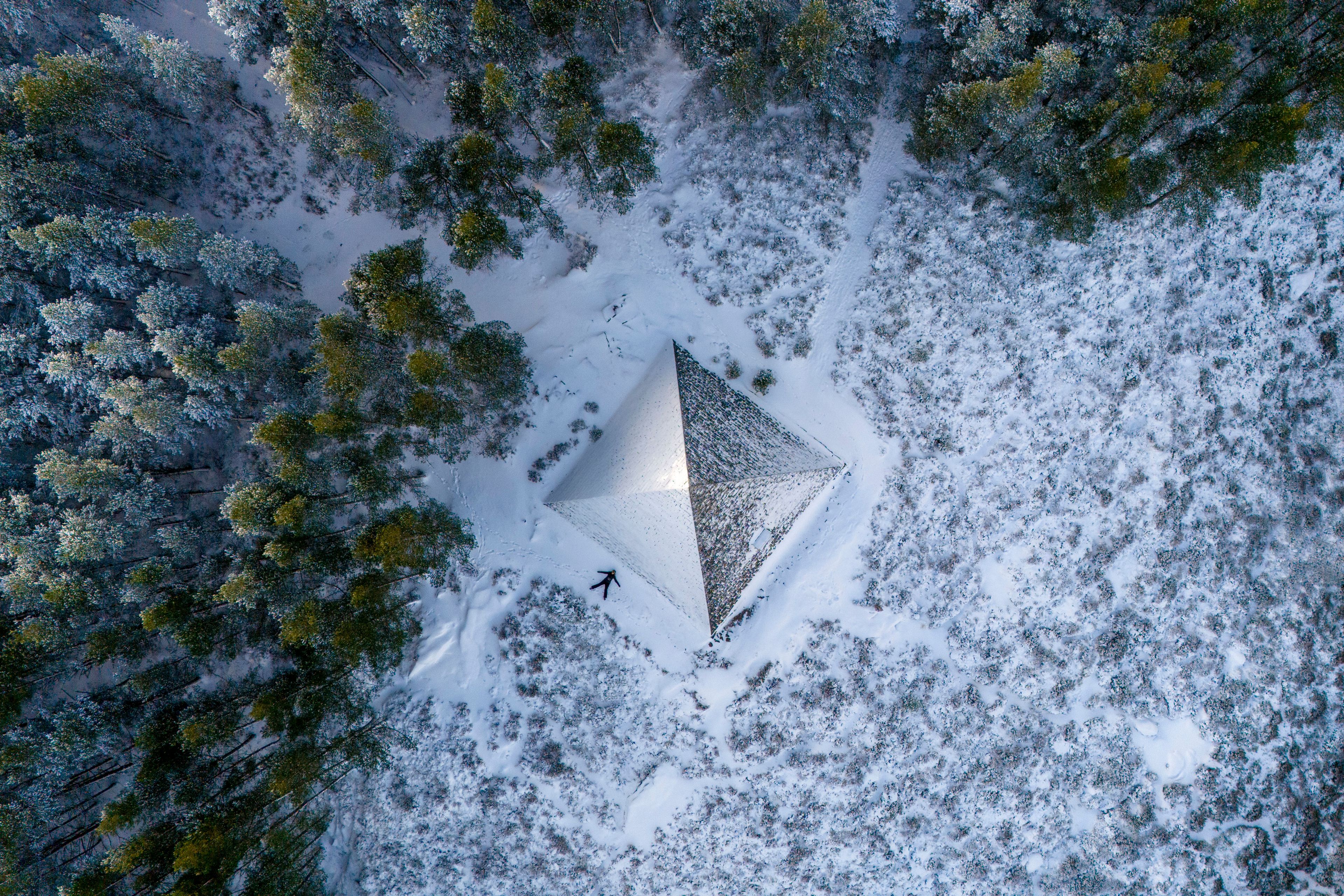 The Prince Albert Cairn, built in 1862 by Queen Victoria, is surrounded by snow and ice, near Balmoral, Aberdeenshire, Scotland, Friday Nov. 22, 2024. (Jane Barlow/PA via AP)