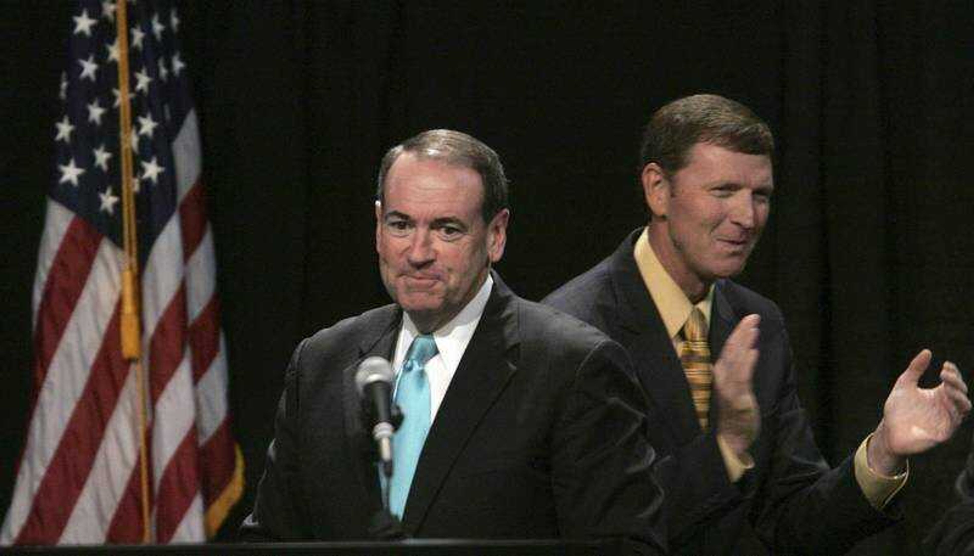 Christopher Gannon ~ The Des Moines Register
Former Arkansas governor Mike Huckabee took the podium after being introduced by Bob Vander Plaats, right, former chairman of Huckabee's Iowa primary campaign, at the Iowa Republican Party state convention in Des Moines, Iowa, July 12. Huckabee will be in Cape Girardeau next month for U.S. Rep. Jo Ann Emerson's annual picnic.