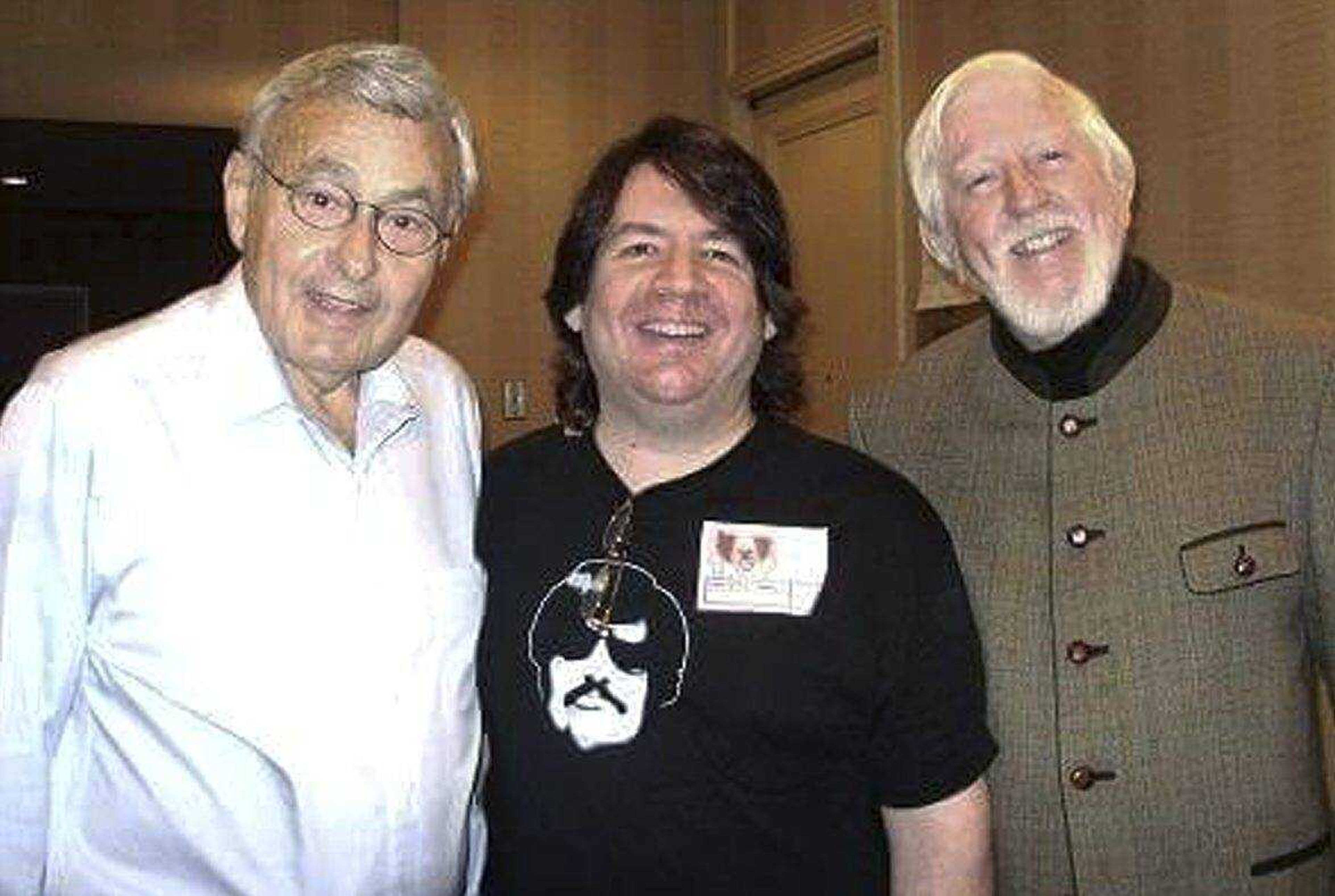 Frank Avruch, left, who played Bozo the Clown, poses with Hersh, center and Carroll Spinney, who played Big Bird and Oscar the Grouch on "Sesame Street," in 2009.