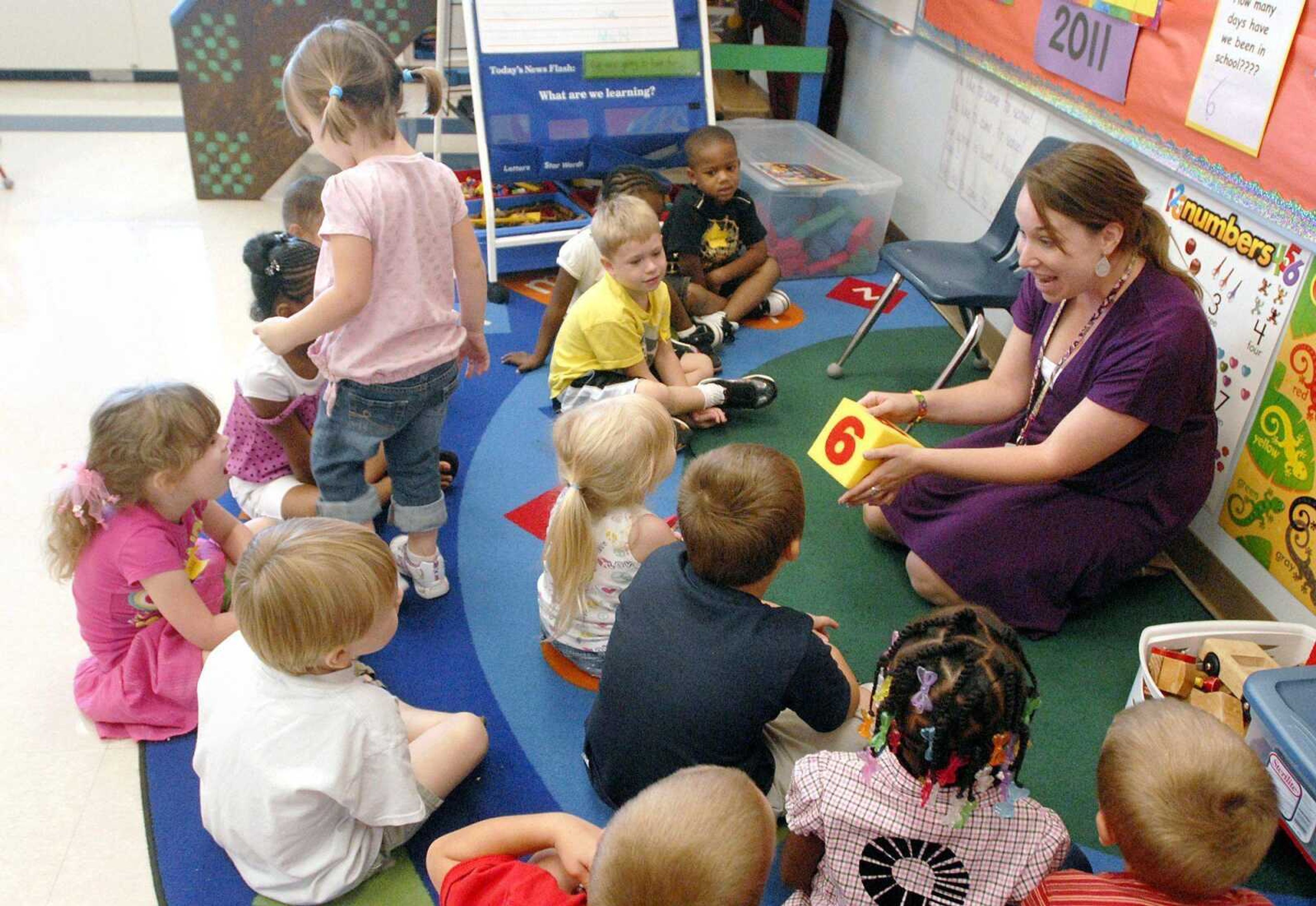 Jennifer Nedilnycky's prekindergarten class rolls a die as part of a number recognition exercise Thursday at Blanchard Elementary in Cape Girardeau. (Laura Simon)