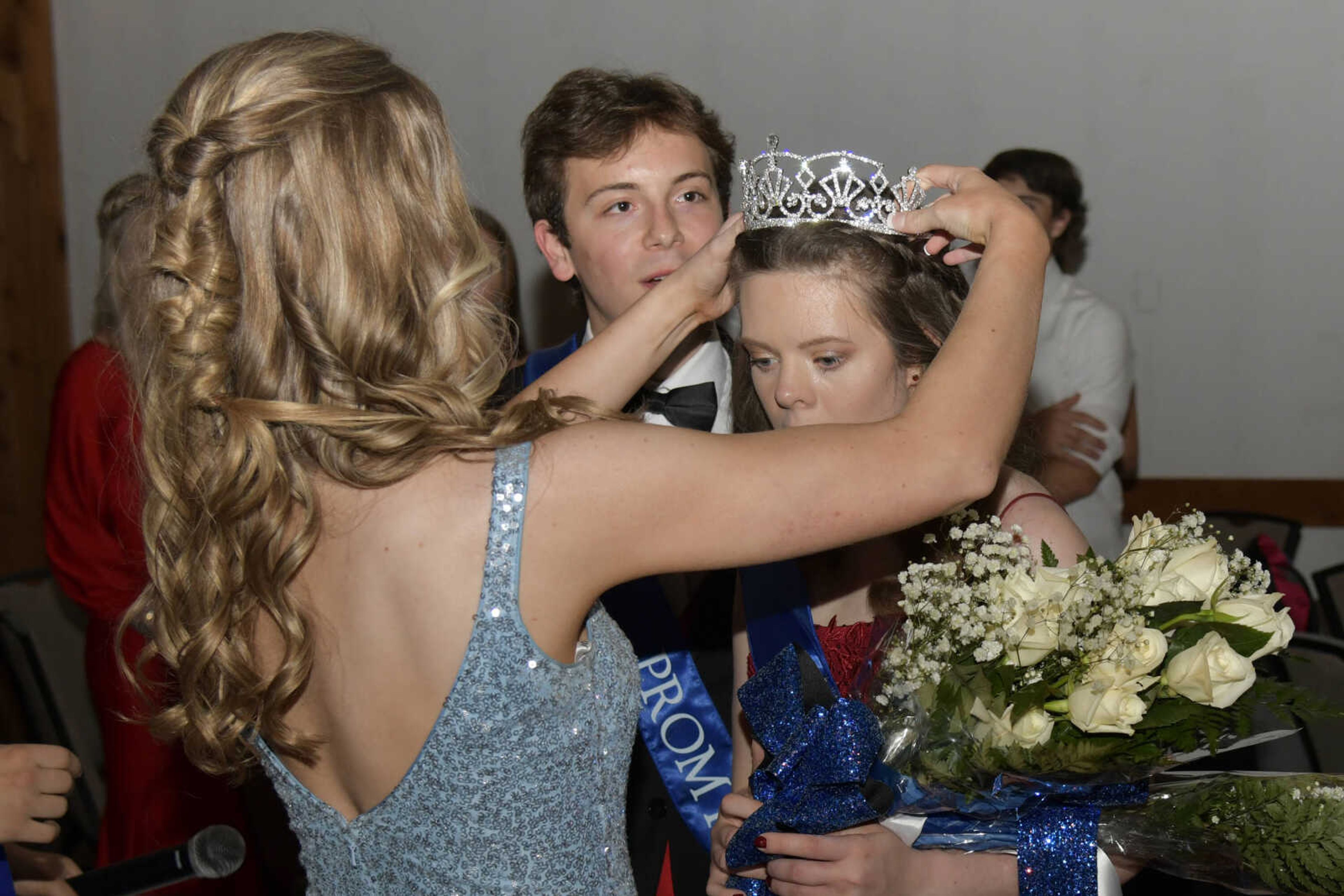 Ashlyn Baer gets crowned prom queen during Notre Dame's prom at Bavarian Halle in Jackson on Friday, April 30, 2021.