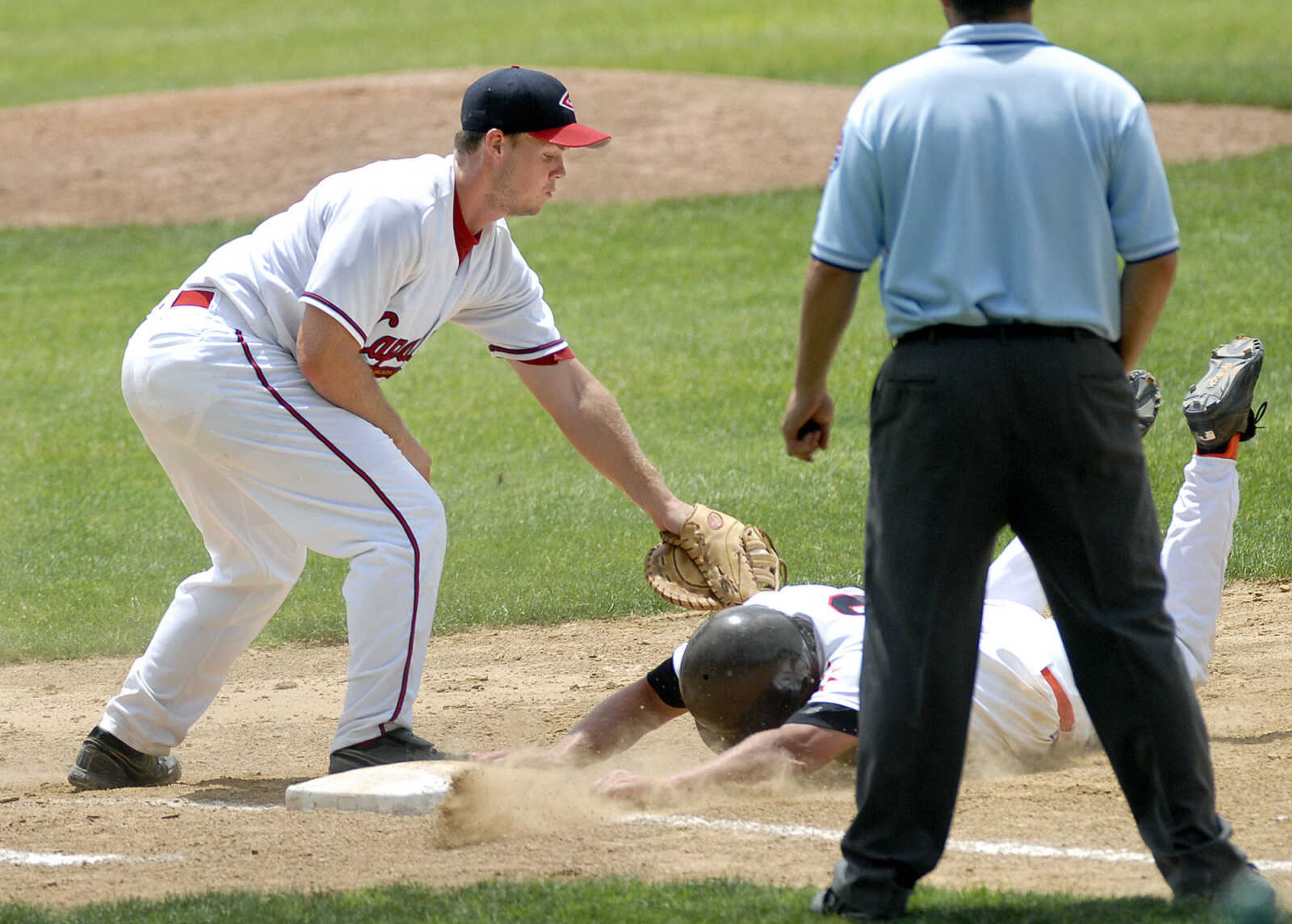 Capahas first baseman Sean Bard attempts to tag out St. Louis Printers' Cubby Bryan in the third inning Saturday at Capaha Field.