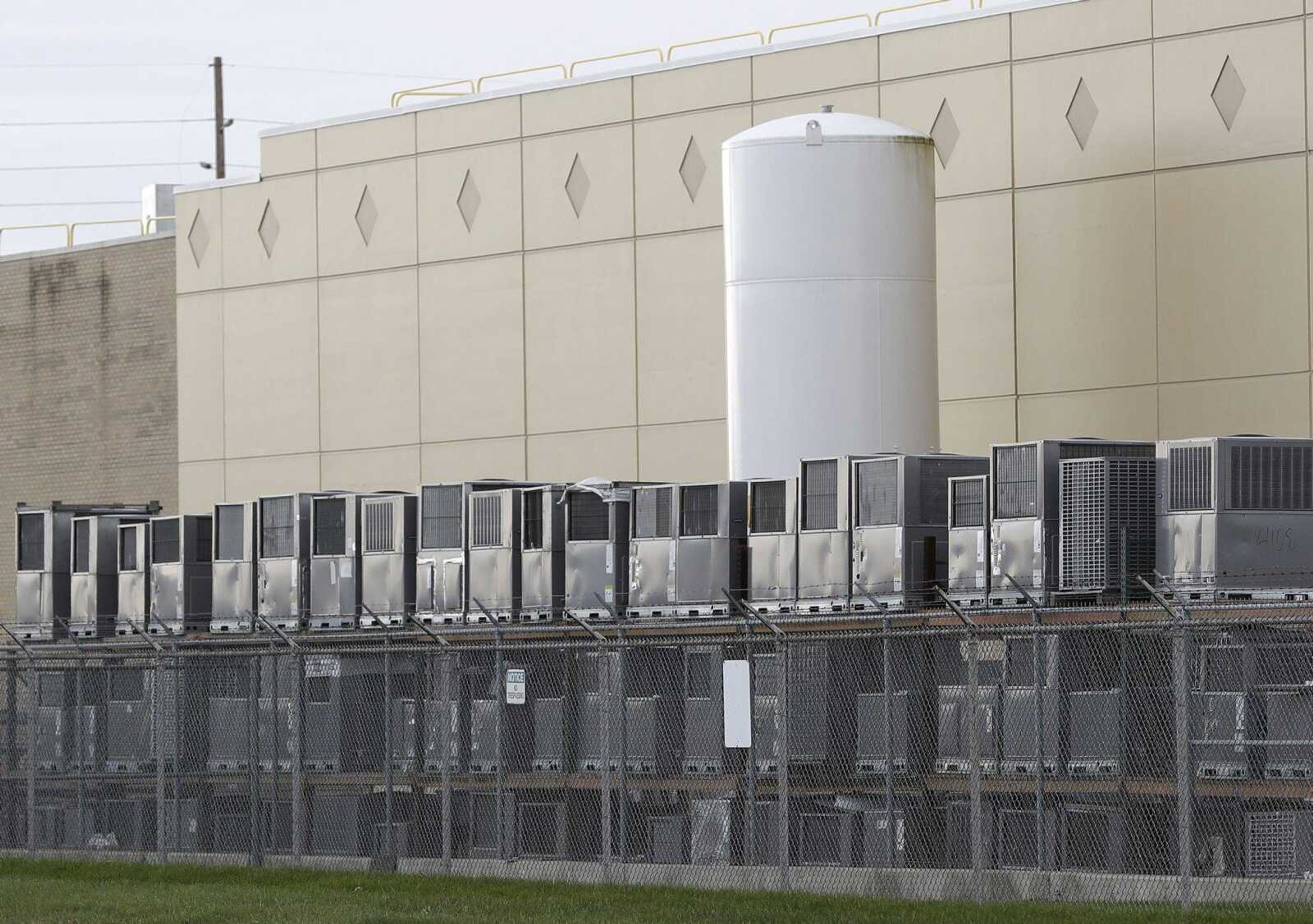 Air-conditioning units are stacked outside the Carrier Corp. plant Wednesday in Indianapolis.