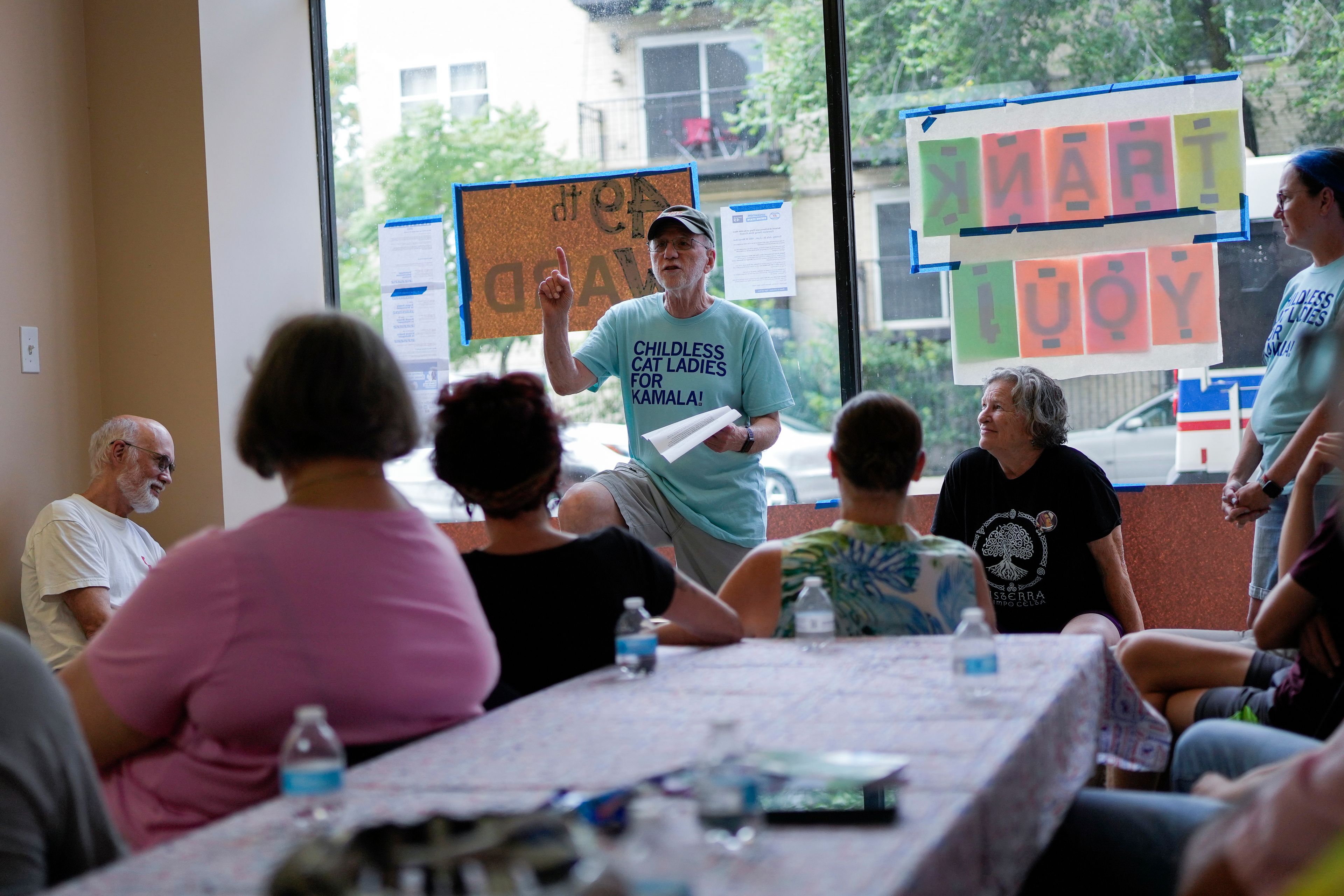 David Kogan, an organizer with Operation Swing State, addresses a group of volunteers who will be canvassing for Vice President Kamala Harris and other Democrats in Michigan and Wisconsin, Sunday, July 28, 2024, at the 49th Ward offices in Chicago. (AP Photo/Erin Hooley)