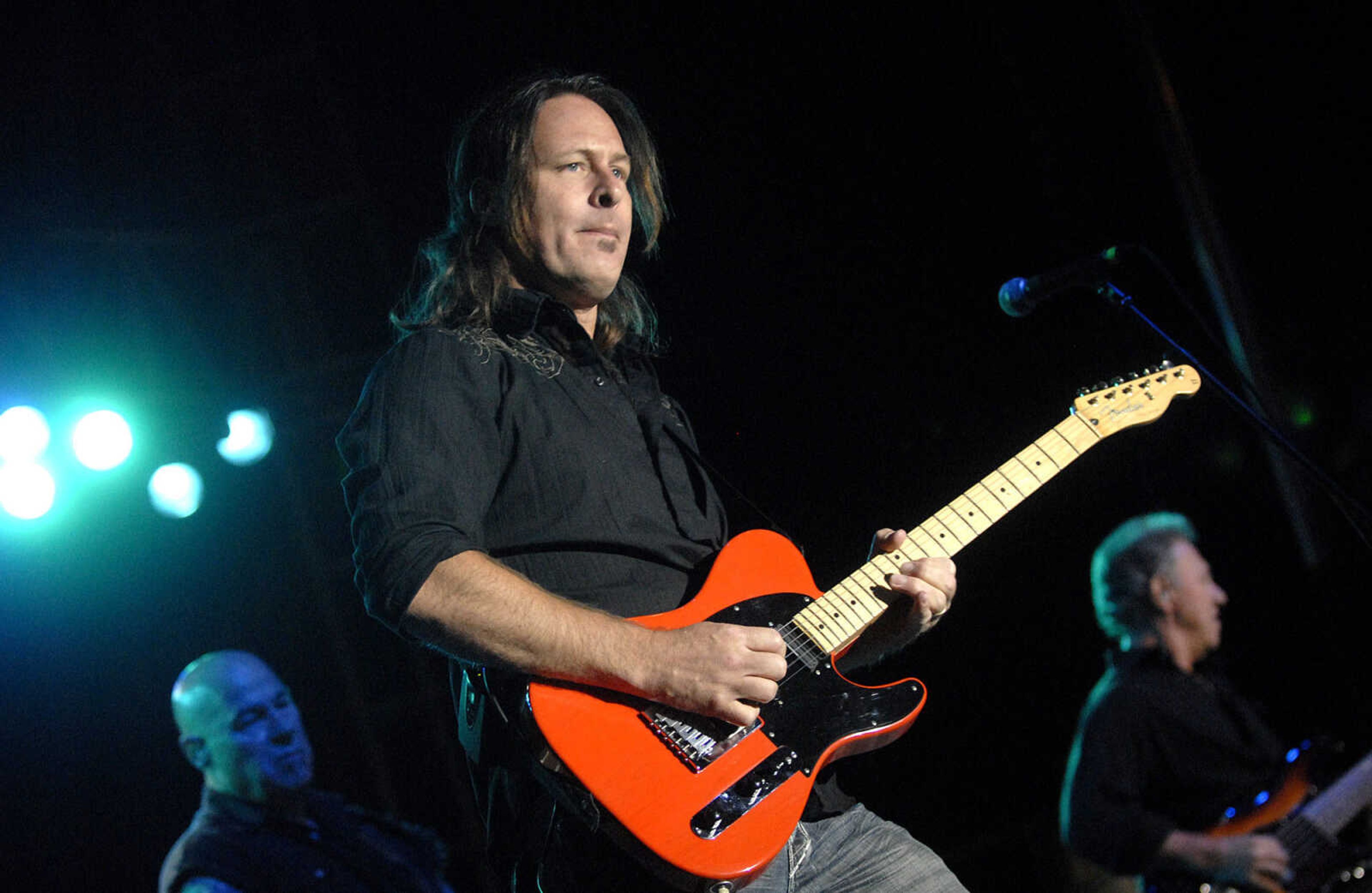 LAURA SIMON ~ lsimon@semissourian.com
Creedence Clearwater Revisited rocks the grandstand at Arena Park Friday, September 16, 2011 during the SEMO District Fair in Cape Girardeau.