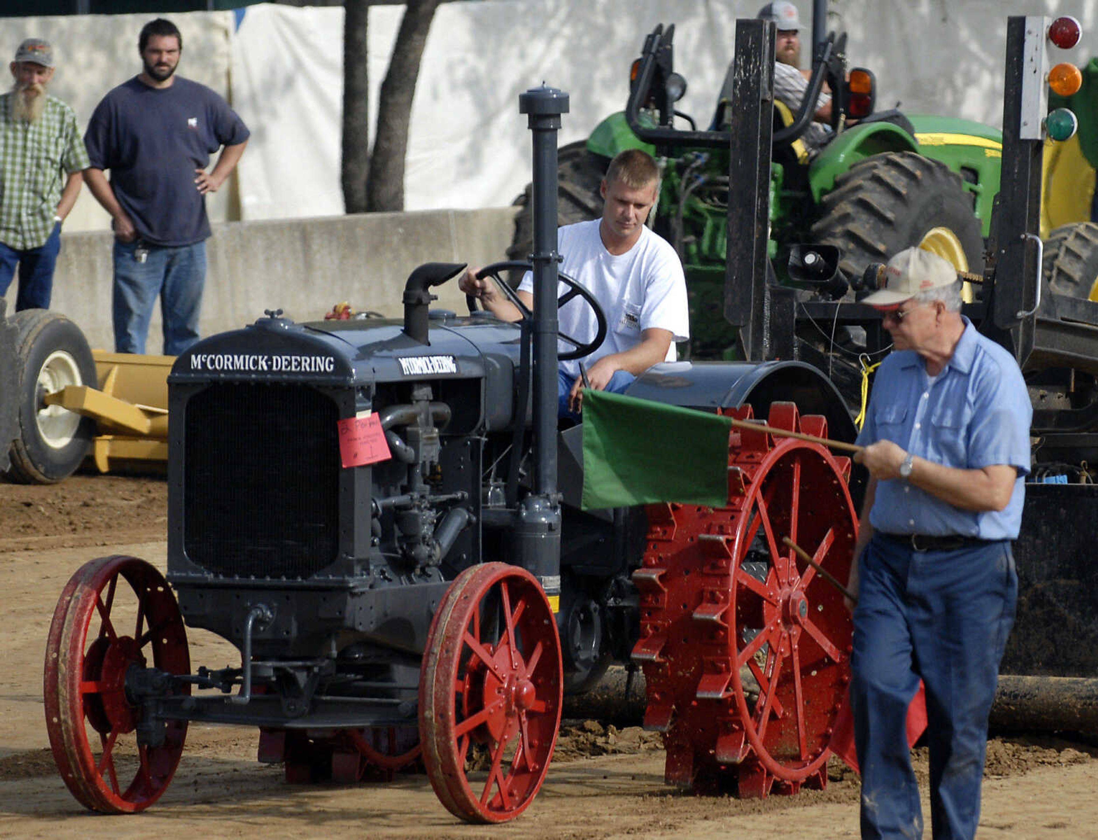 KRISTIN EBERTS ~ keberts@semissourian.com

Travis Watlher drives his 1936 McCormick-Deering W-30 tractor during the antique tractor pull put on by the Egypt Mills Antique Tractor Club at the SEMO District Fair on Saturday, Sept. 10, 2011.