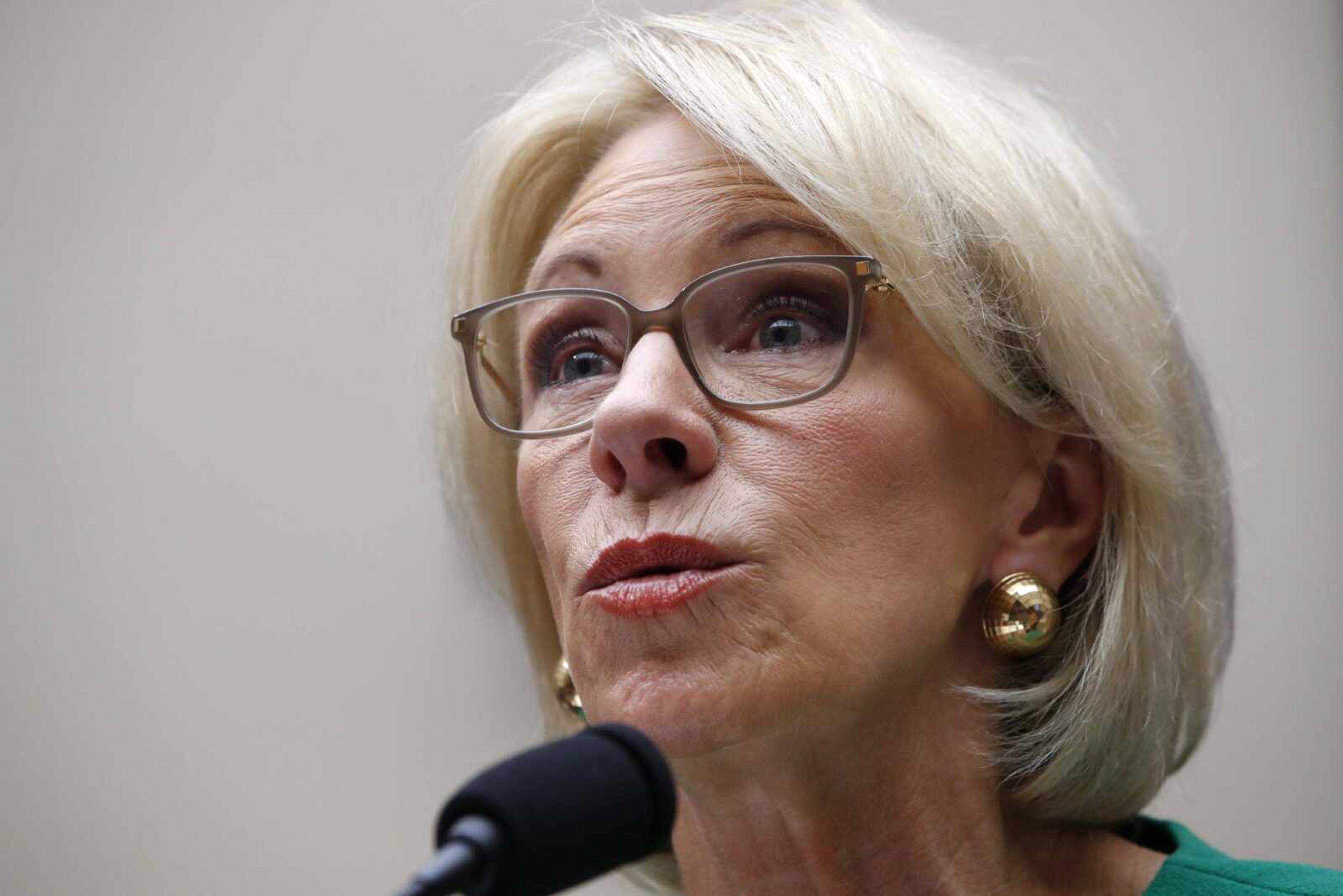 Education Secretary Betsy DeVos testifies at a House Committee on Education and the Workforce on Capitol Hill in Washington. The Trump administration is rescinding Obama-era guidance encouraging schools to take a person's race into account to encourage diversity in admissions.