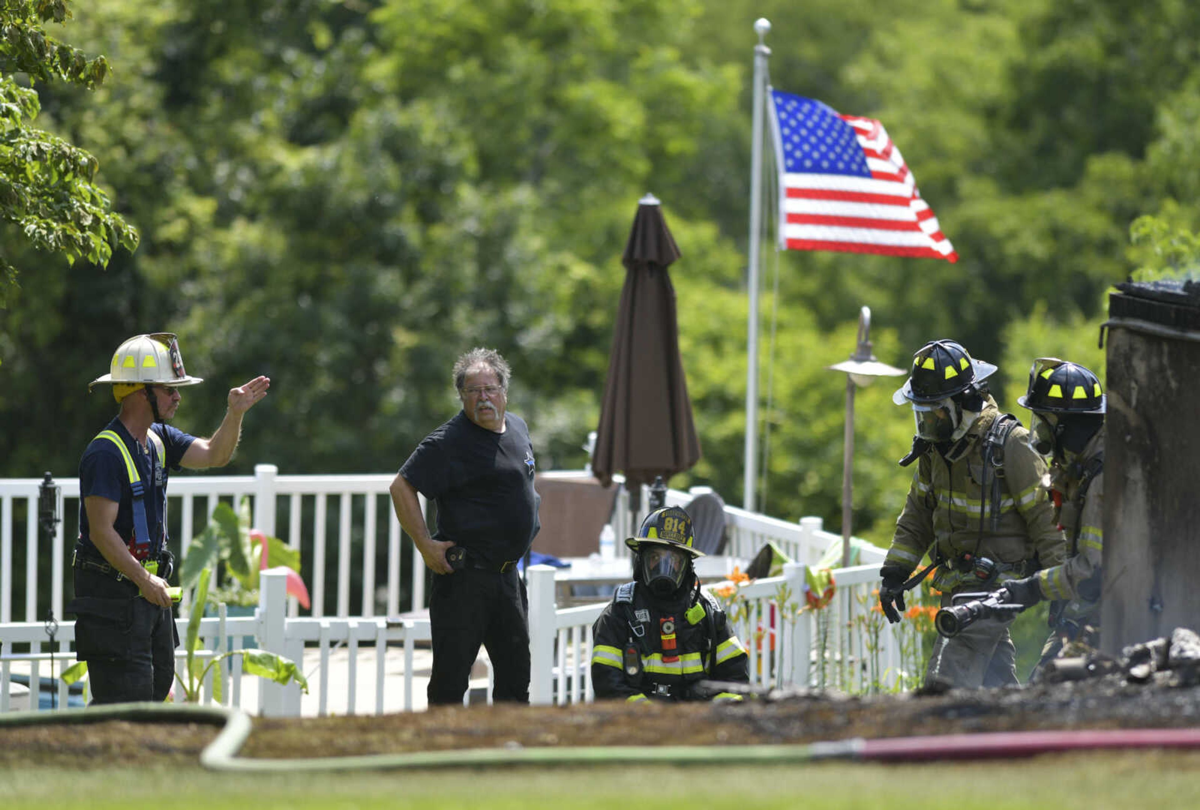 Members of the NBC Fire Protection District receive mutual aid from the Oran Fire Protection District, the Scott City Fire Department, the Scott County Rural Fire Protection District and the Scott County Sheriff's Office during a working fire Thursday, June 25, 2020, in the 300 block of Lake Road in Scott County between U.S. Highway 61 and Interstate 55.