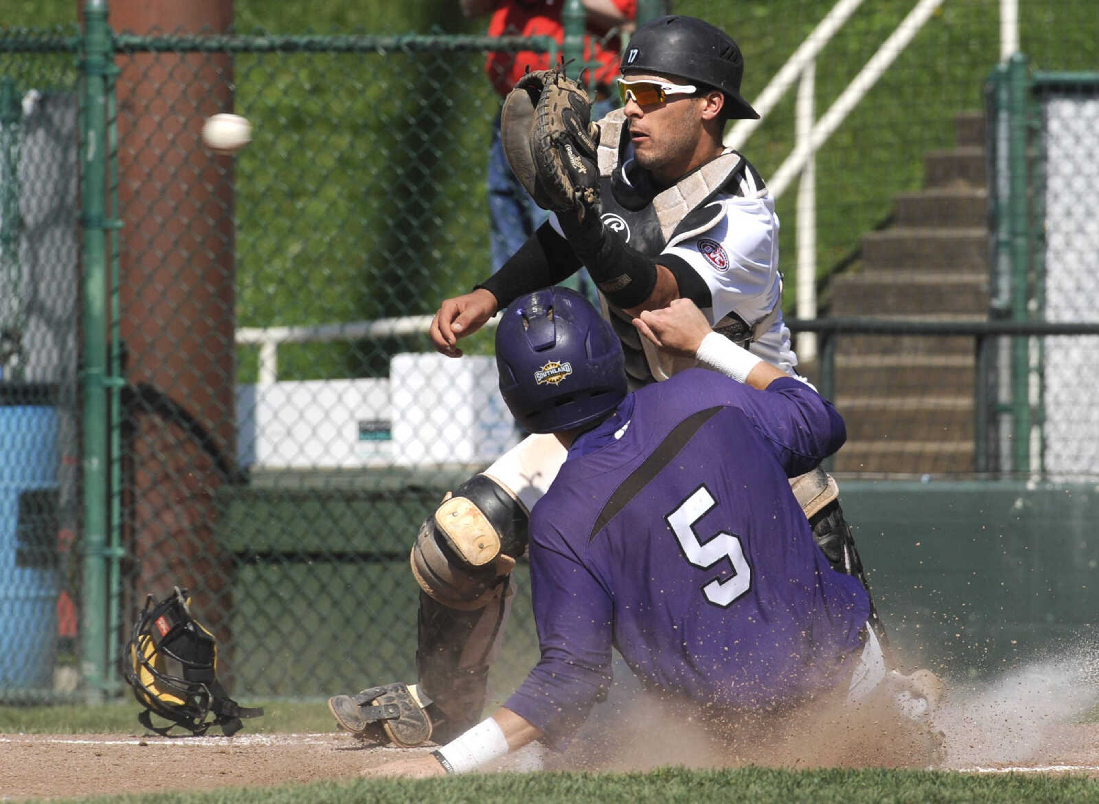 Southeast Missouri State catcher Brian Lees takes the throw as Stephen F. Austin baserunner Conner Fikes steals home to tie the score 2-2 during the seventh inning Friday, May 13, 2016 at Capaha Field. 