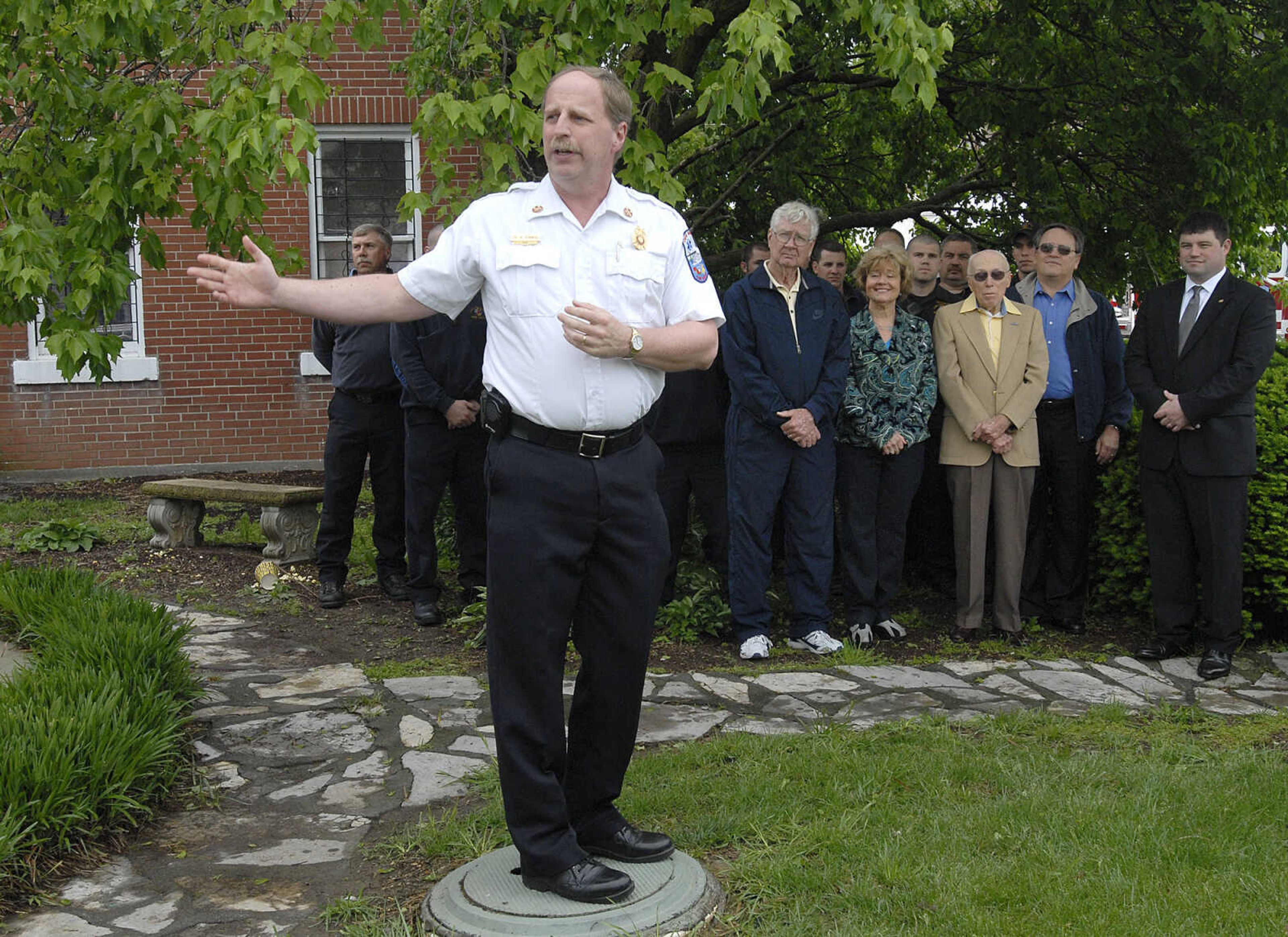 Cape Girardeau fire chief Rick Ennis welcomes people to the fire department's 100th anniversary celebration.