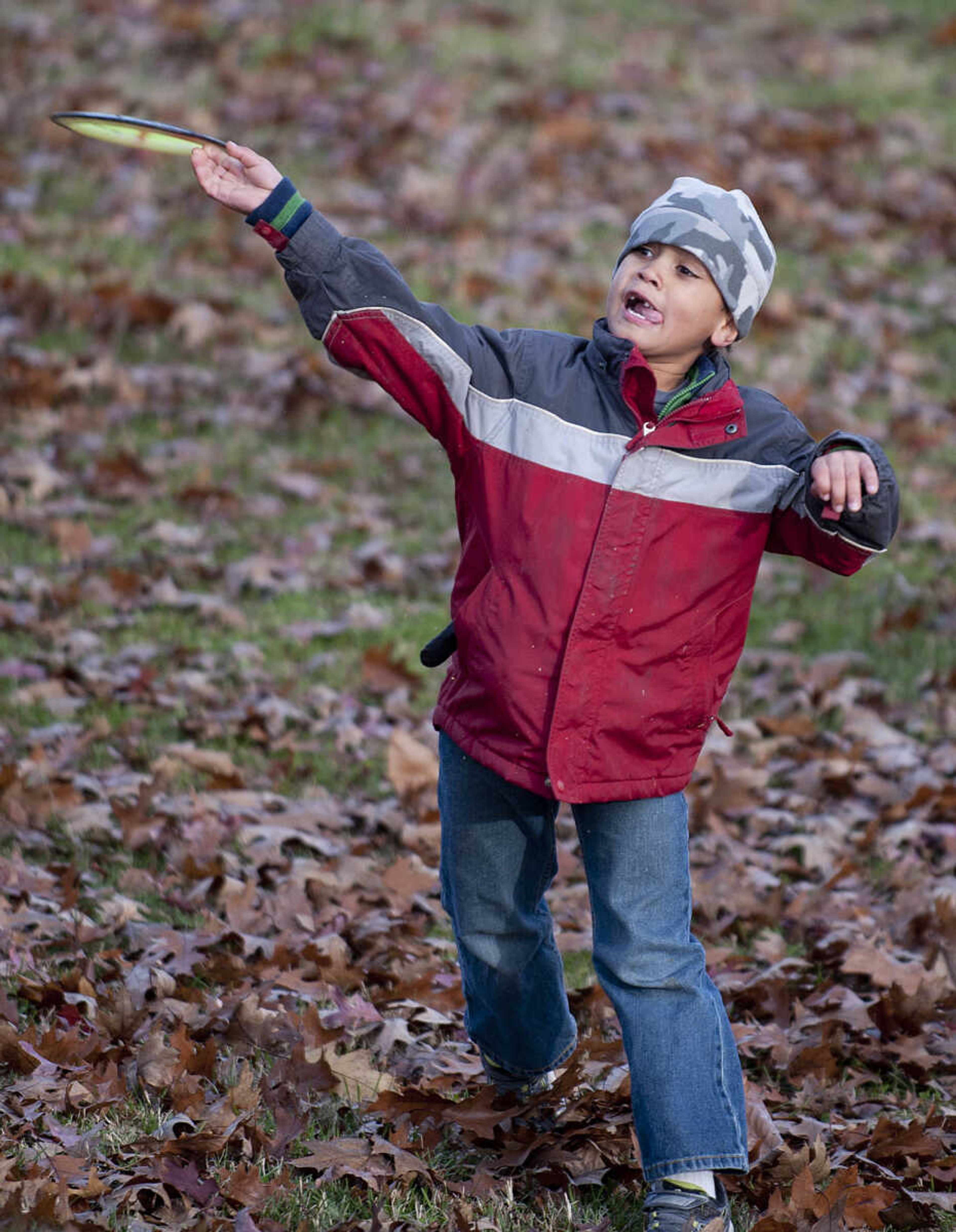 Michael McDonald, 7, hits an approach shot during the Fountain of Life Disc Golf Tournament Sunday, Nov. 24, at Capaha Park in Cape Girardeau. Organizers estimated that approximately 30 people played in the tournament which raised around $2,500 which will go towards construction of a fresh water well for a village in Swaziland, Africa.