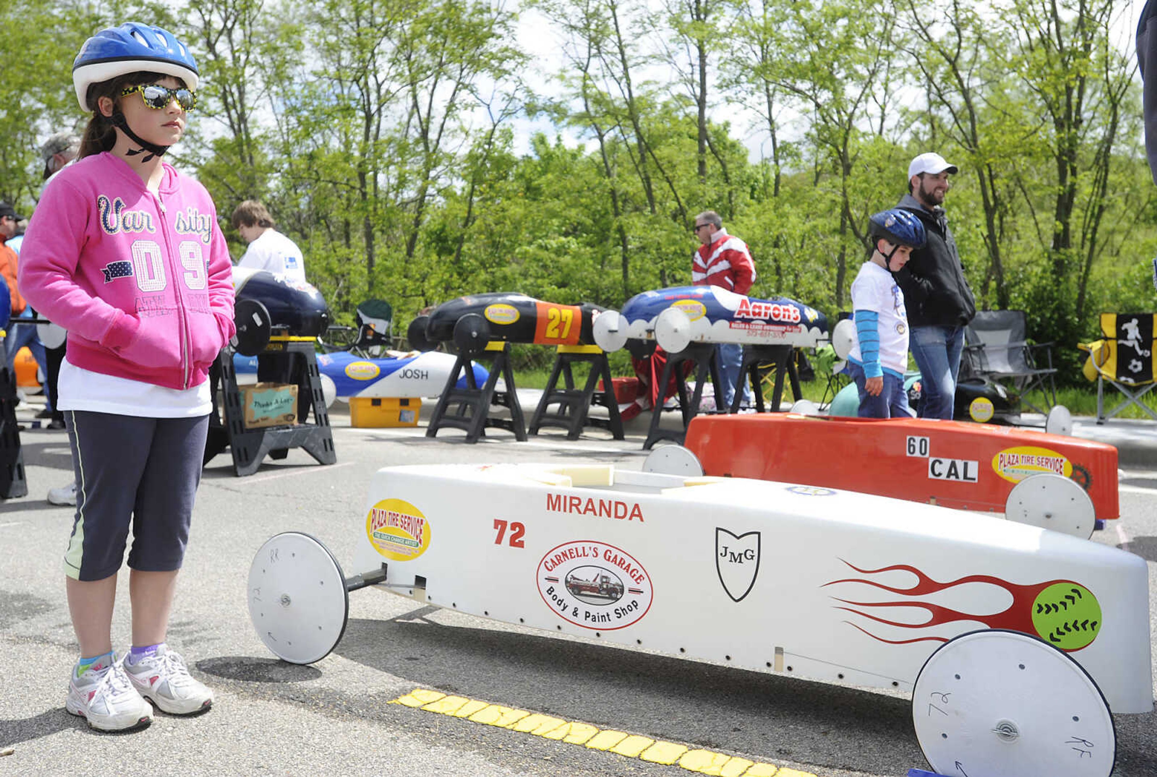 Miranda Carnell, 9, of Gordonville, Mo., waits for her turn to race during the 2013 Soap Box Derby Saturday, May 4, at Blanchard Elementary School, 1829 N. Sprigg St., in Cape Girardeau. Racers ranging in age from 7 to 17 competed in two divisions at the event which is a fundraiser for the Cape Girardeau Rotary Club. The winners in each division will go on to compete in the All-American Soap Box Derby held in Akron, Ohio in July.