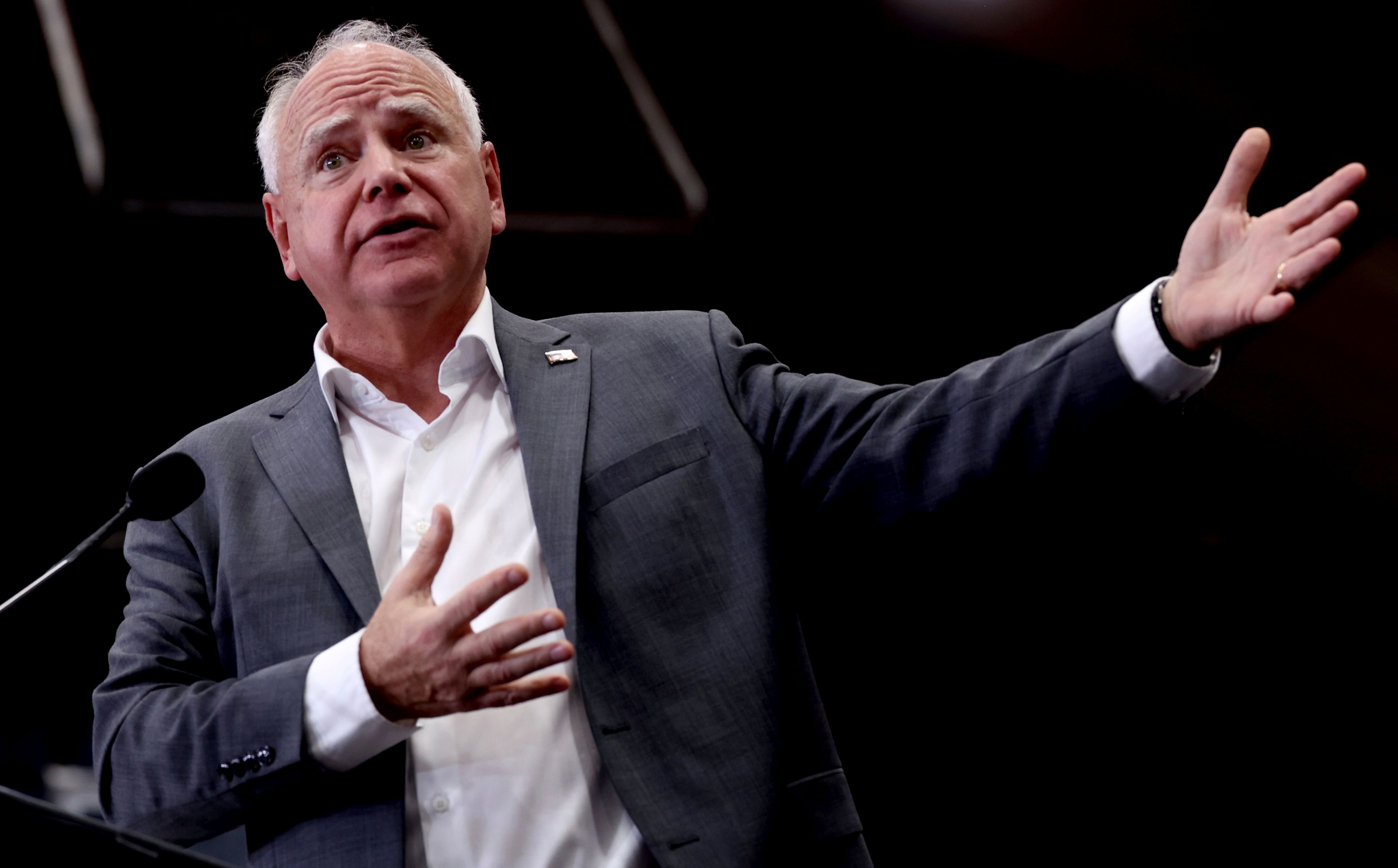 Democratic vice presidential candidate Minnesota Gov. Tim Walz speaks to the crowd during an early voting rally at Palo Verde High School in Tucson, Ariz., Wednesday, Oct. 9, 2024. (Kelly Presnell/Arizona Daily Star via AP)