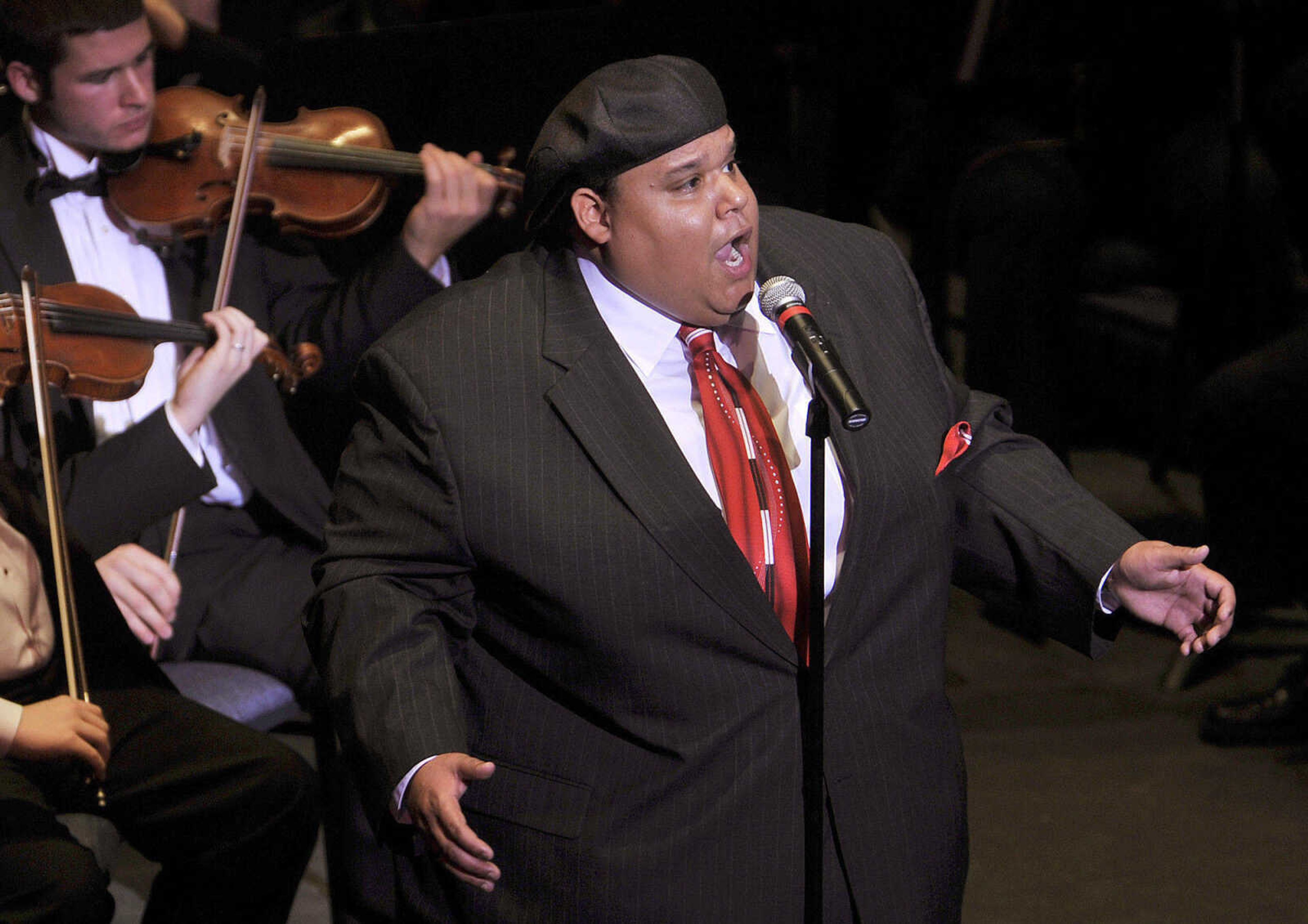 Neal E. Boyd sings "Somewhere" from West Side Story with the Southeast Missouri Symphony Orchestra on Feb. 5, 2010 at Bedell Performance Hall. Boyd was the guest artist at the sold-out symphonic pops concert. (Fred Lynch)