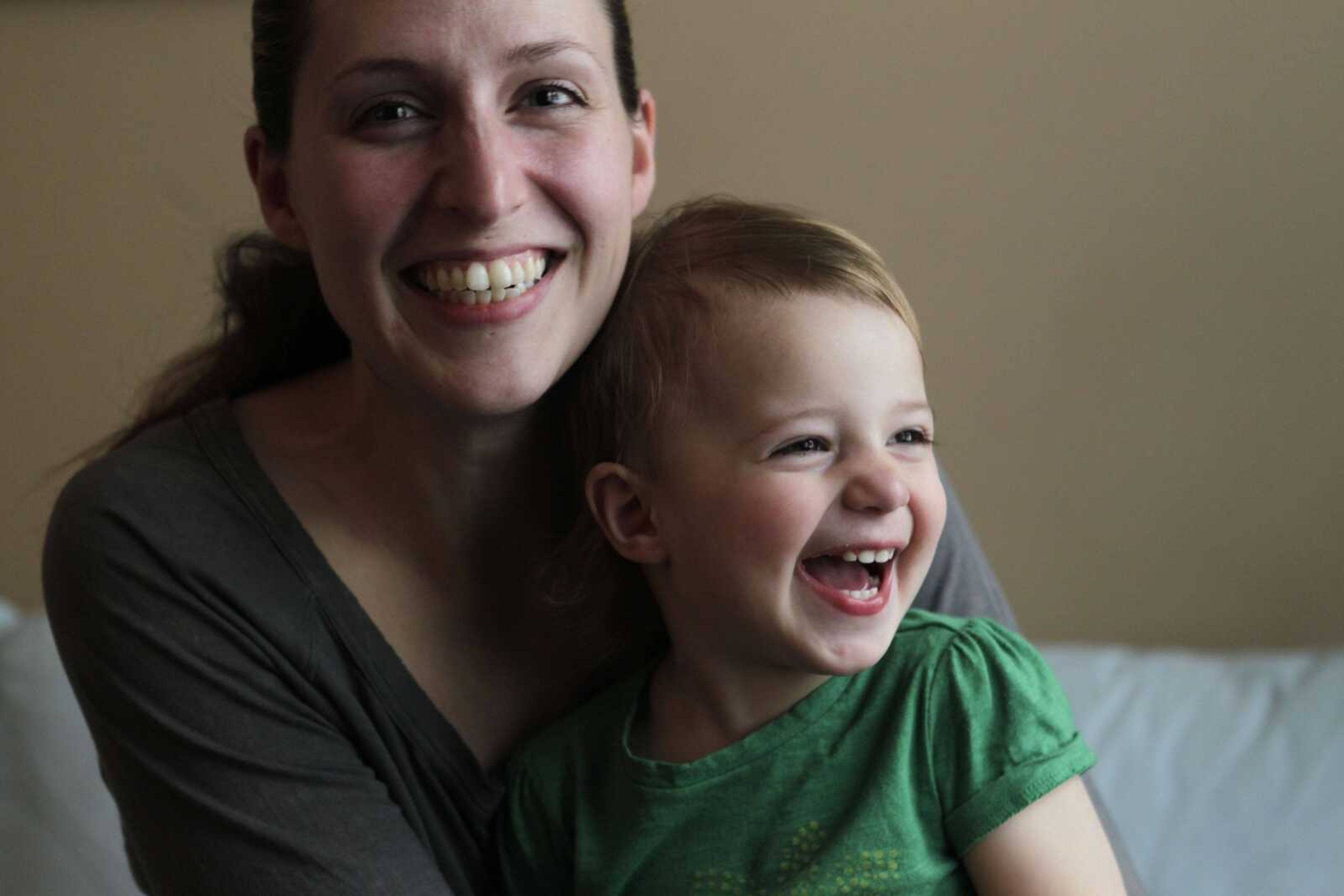 In this March 23, 2011 photo, Roxy Sterbenz, 21-months, and her mother, Leni Calas, pose for a picture in their home in New York. That nonstop crying of a baby with colic has some parents turning to popular folk remedies. Unfortunately, there's no good evidence they work, according to a review of 15 studies. The results don't surprise New York City mom Leni Calas, 32. She tried many treatments studied, including fennel extract, sugar drops and massage, and says nothing worked for baby Roxy, who cried almost nonstop for six months. (AP Photo/Seth Wenig)