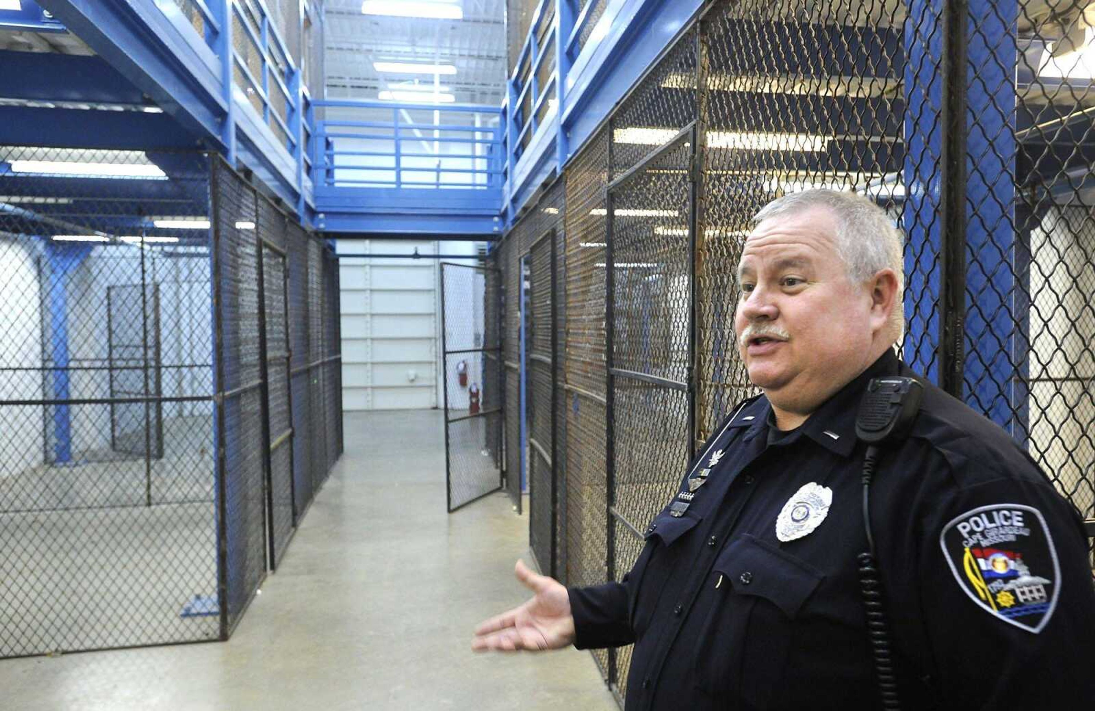 Cape Girardeau Police Lt. John Davis shows a storage area Tuesday in the former Naval Reserve building next to Arena Park in Cape Girardeau. The police department plans to use the building as a police station.