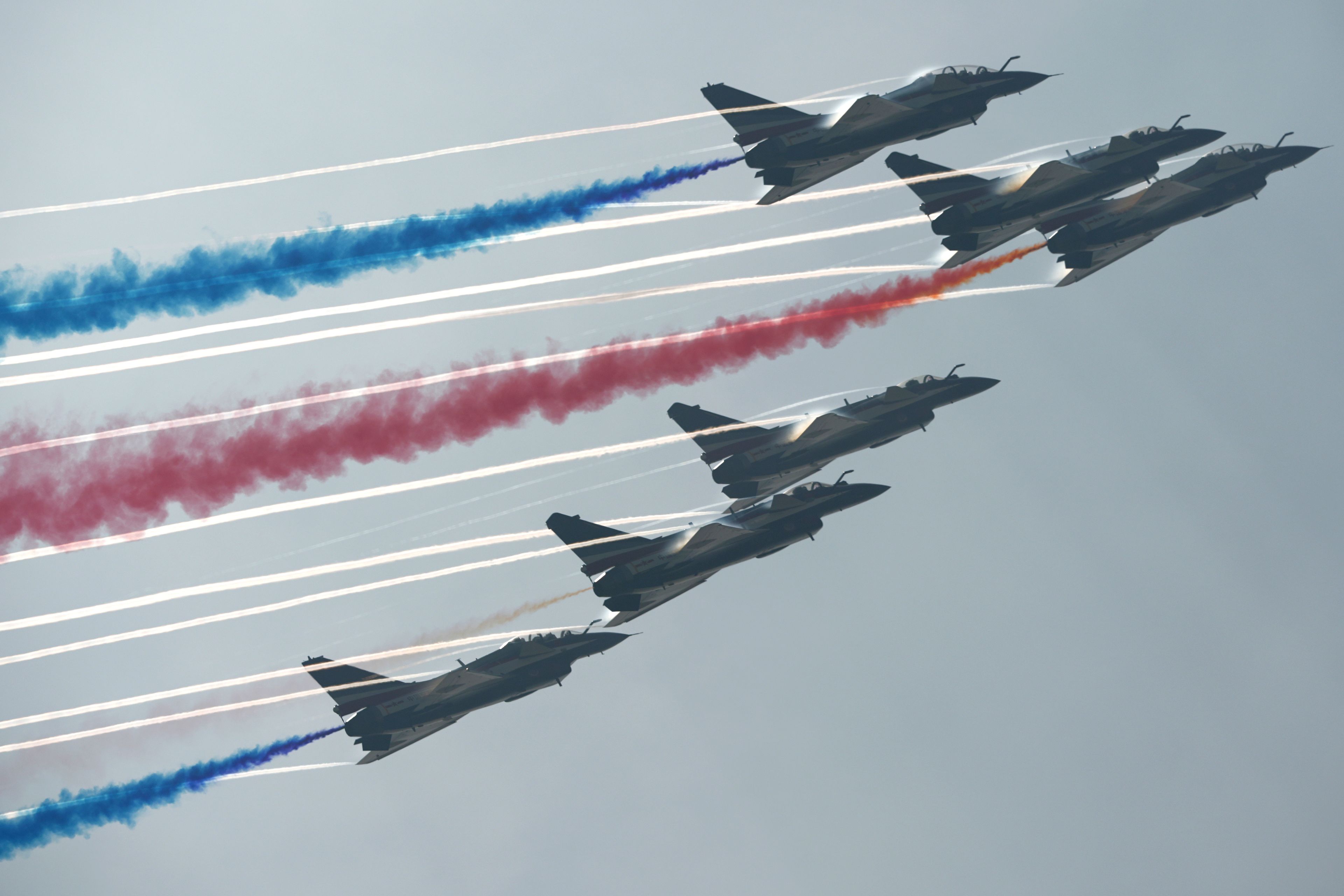 The Chinese Bayi aerobatics team take to the sky at the 15th China International Aviation and Aerospace Exhibition, also known as Airshow China 2024 at Zhuhai in southern China's Guangdong province on Tuesday, Nov. 12, 2024. (AP Photo/Ng Han Guan)