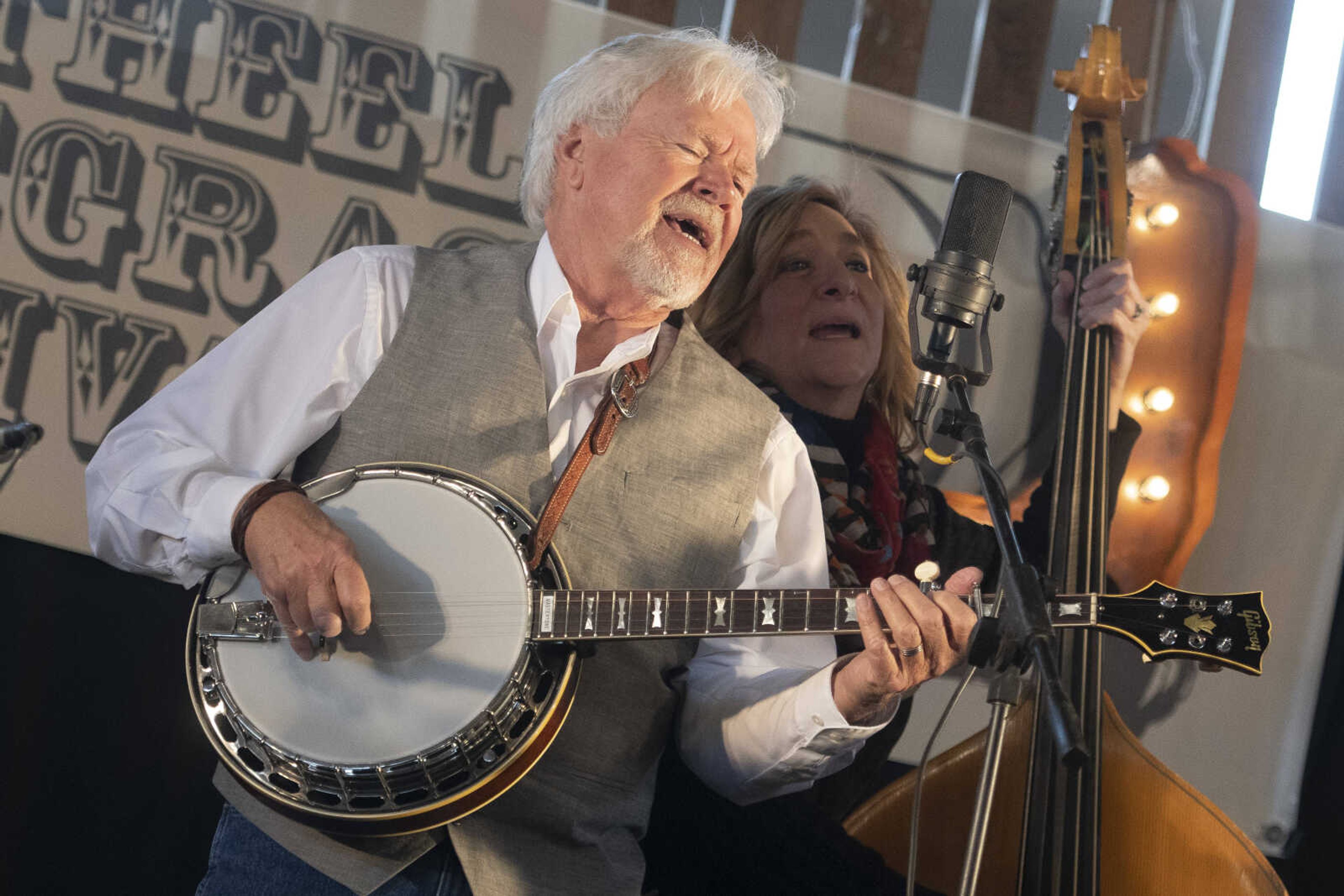 Ed Long and Diane Long, both of Ozark, Missouri, sing with Possum Trot on Friday, Jan. 24, 2020, during the Bootheel Bluegrass Festival at the Bavarian Halle in Fruitland.