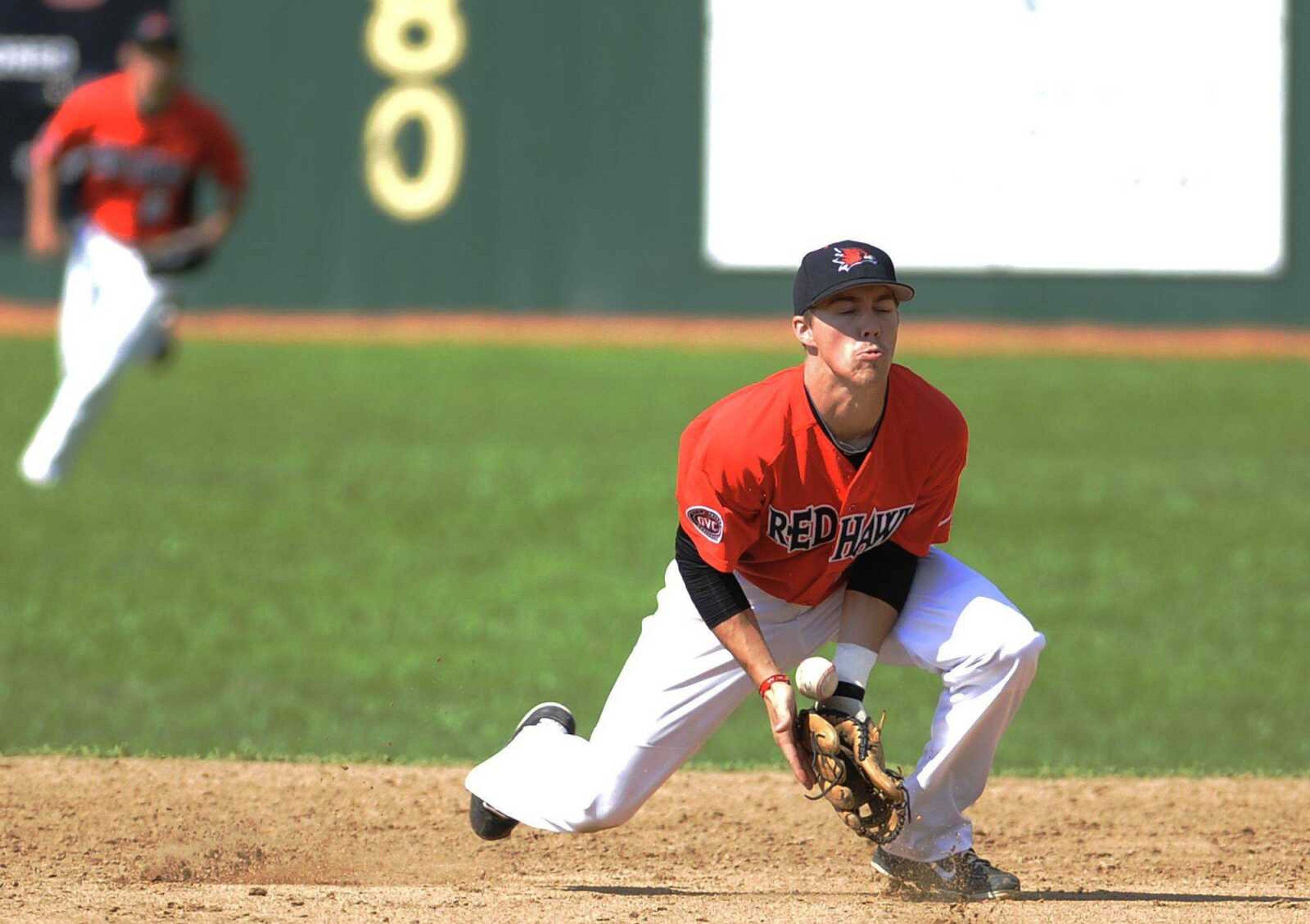 Southeast Missouri State second baseman John Logan Zink bobbles the ball while fielding a grounder during the Redhawks&#8217; 5-2 loss to Austin Peay on Saturday. Zink threw out the Governors&#8217; Dylan Riner on the play. (ADAM VOGLER)