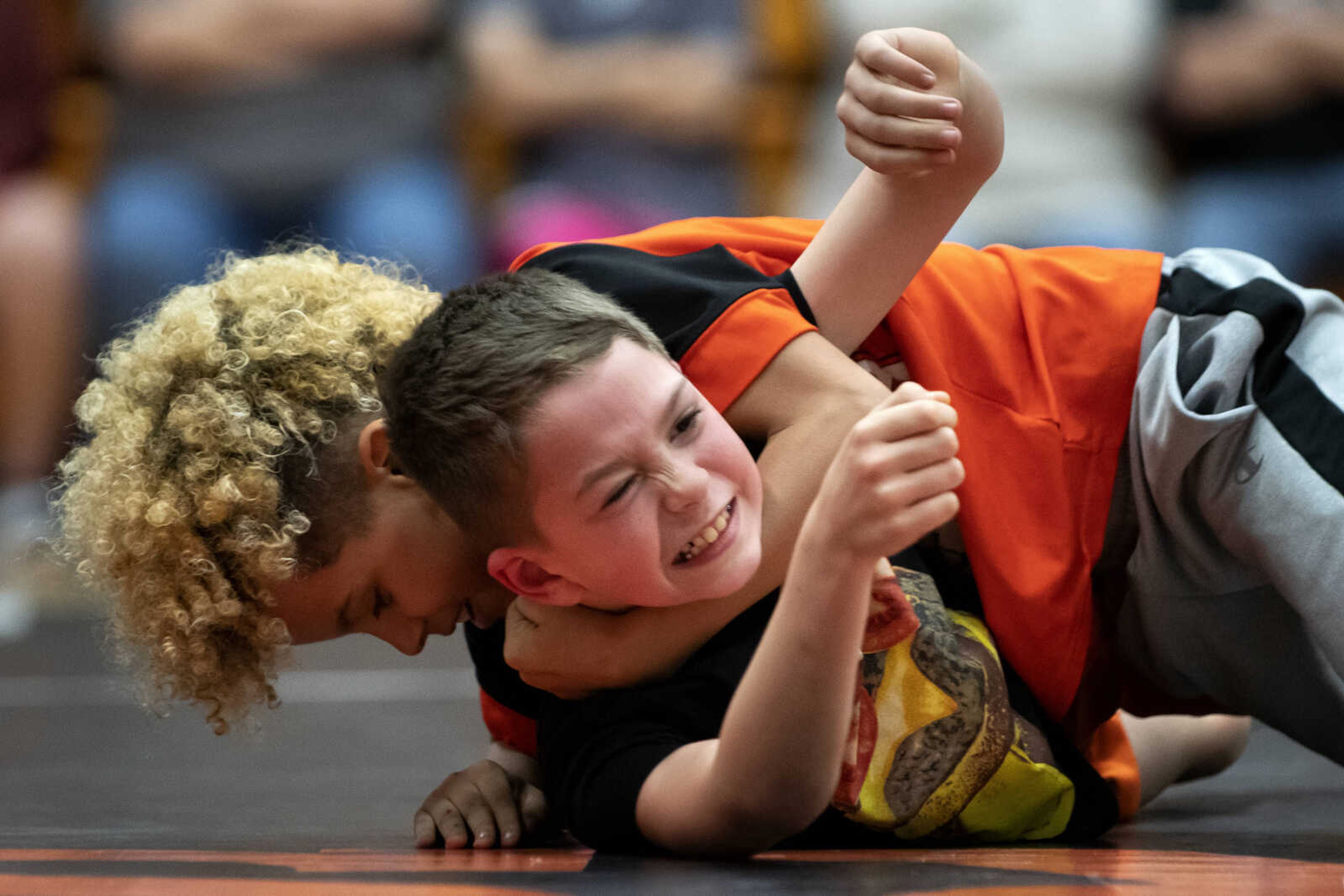 Corbin Matysik wrestles Arjay Jennings, on top, both 9 and of Cape Girardeau, during a match of Cape Girardeau Little League Wrestling on Tuesday, March 19, 2019, at Cape Central High School.