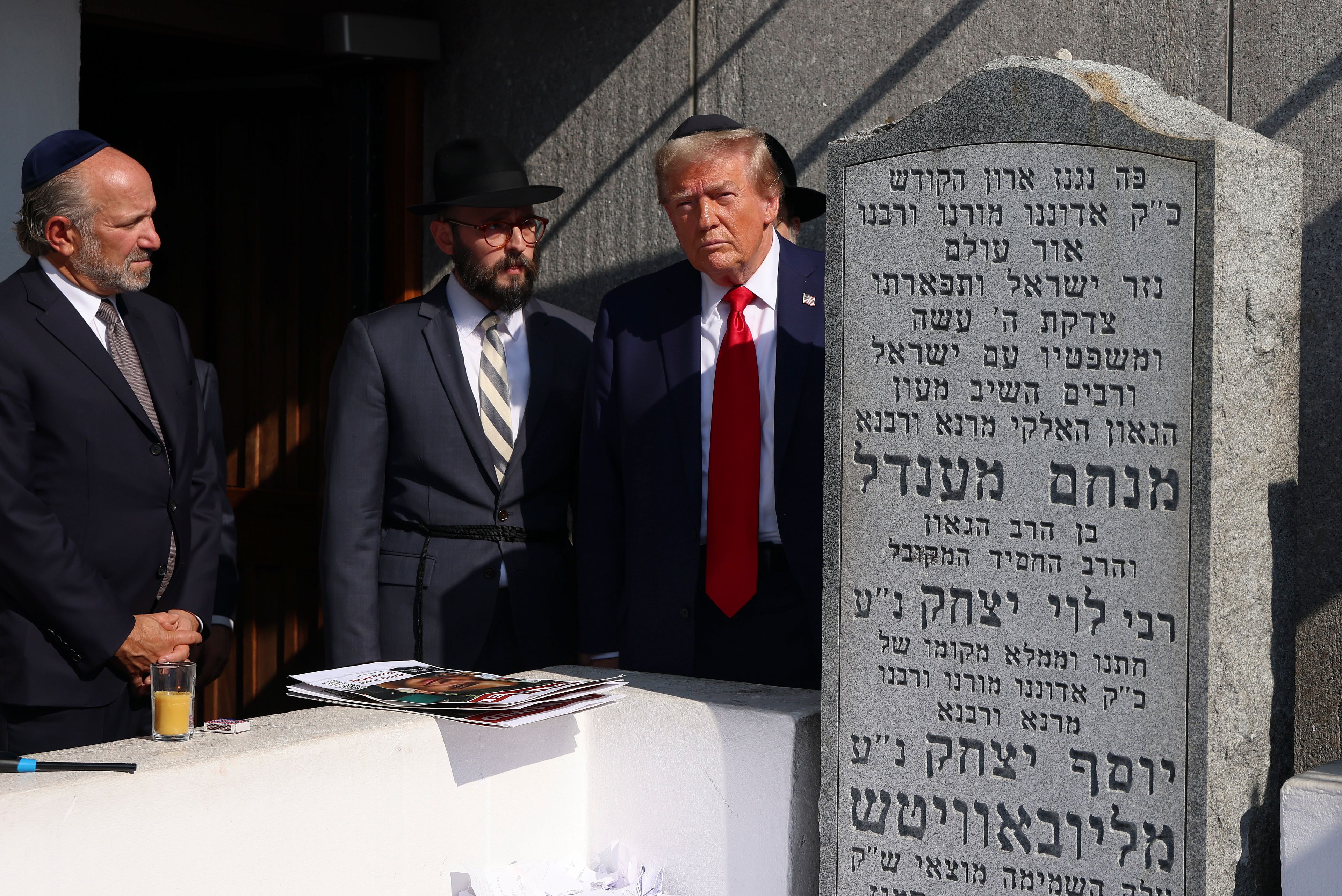 Republican presidential nominee former President Donald Trump visits the gravesite of Rabbi Menachem Mendel Schneerson at Ohel Chabad-Lubavitch, Monday, Oct. 7, 2024, in New York. (AP Photo/Yuki Iwamura)