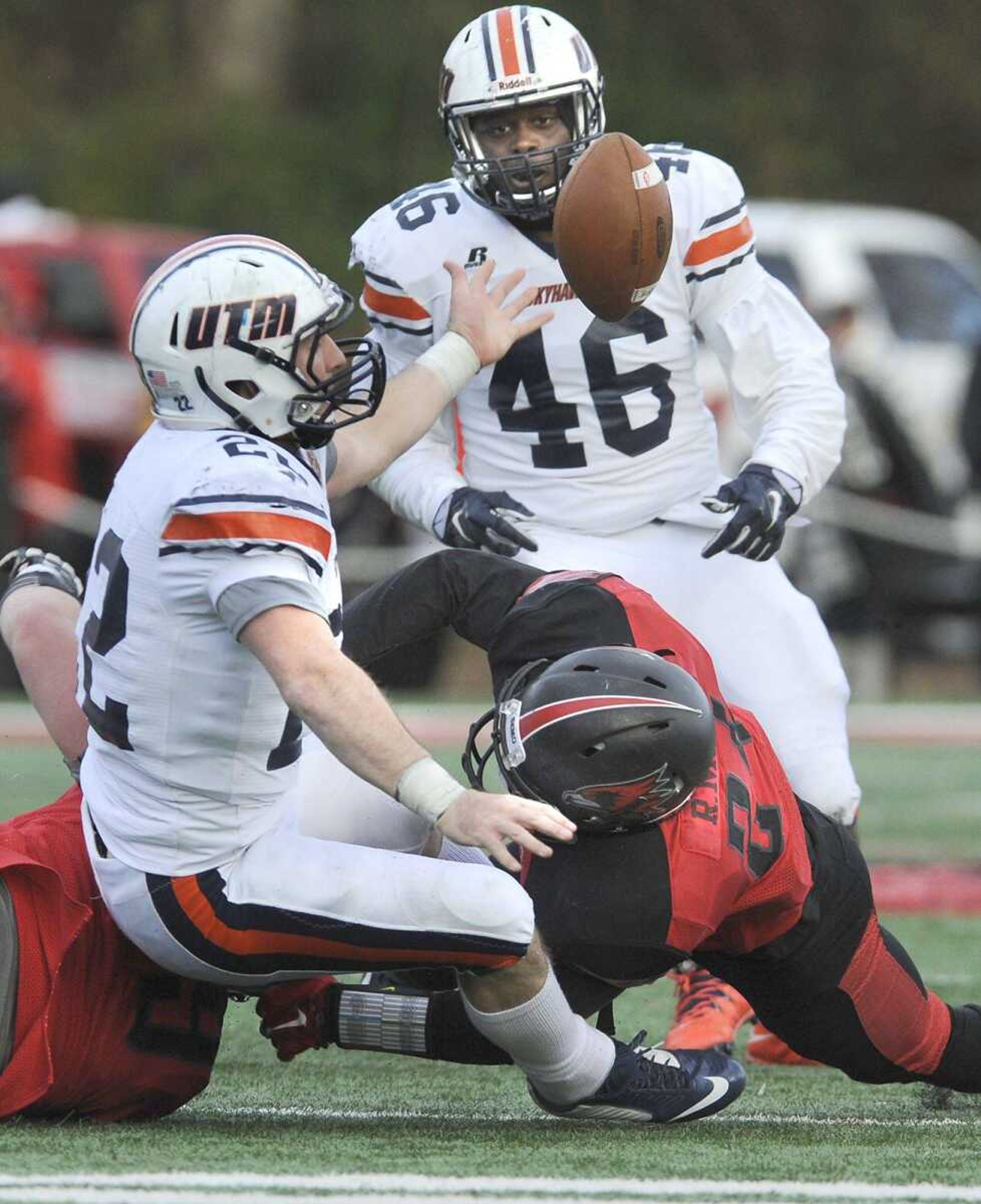 UT Martin's Trent Garland fumbles the ball on a play by Southeast Missouri State's Ryan Moore during the fourth quarter Saturday at Houck Stadium. (Fred Lynch)