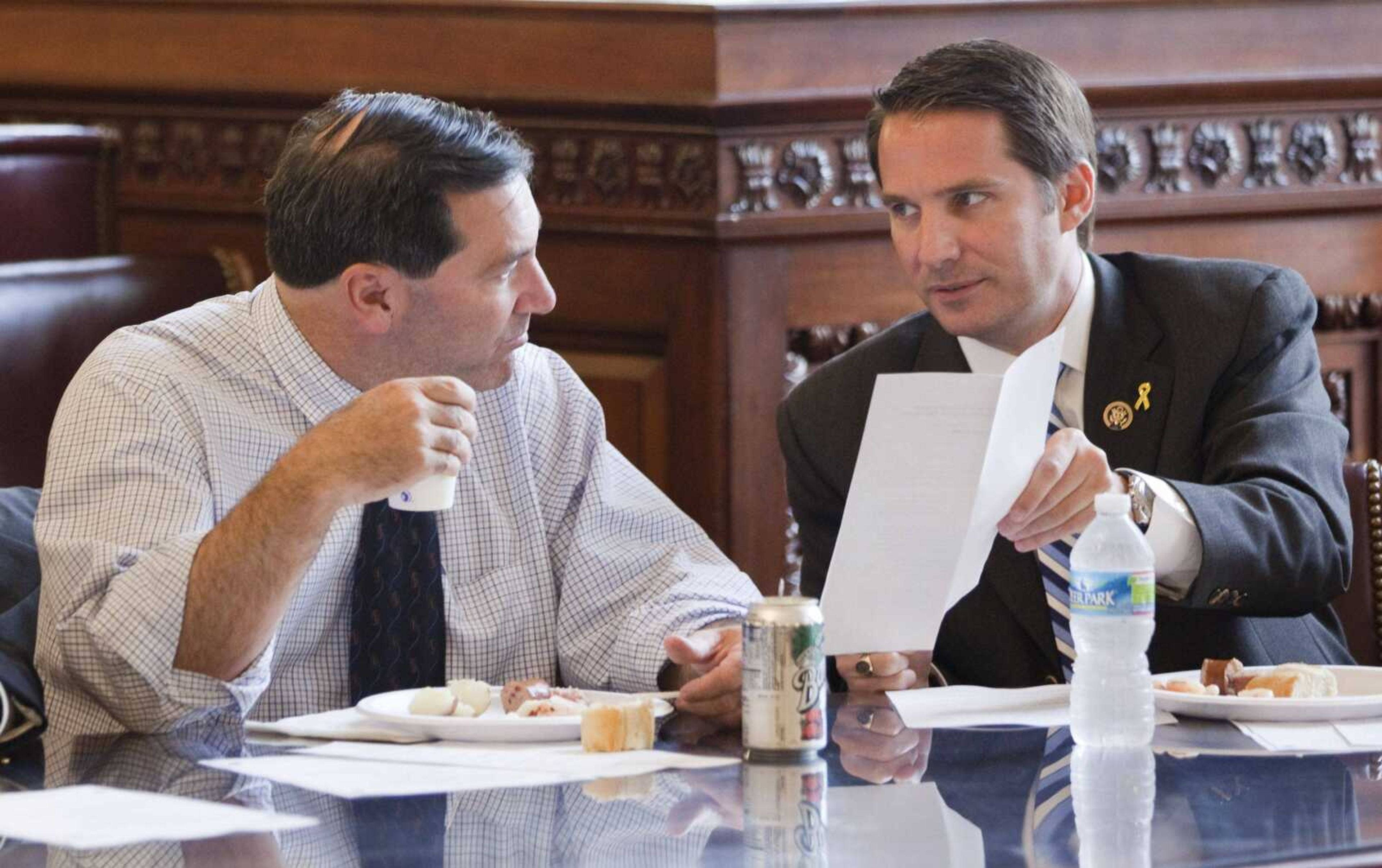 Rep. Joe Donnelly, D-Ind., left, and Rep. Glen Nye, D-Va., talk before a Tuesday meeting of Blue Dog Democrats in Washington. (Evan Vucci ~ Associated Press)