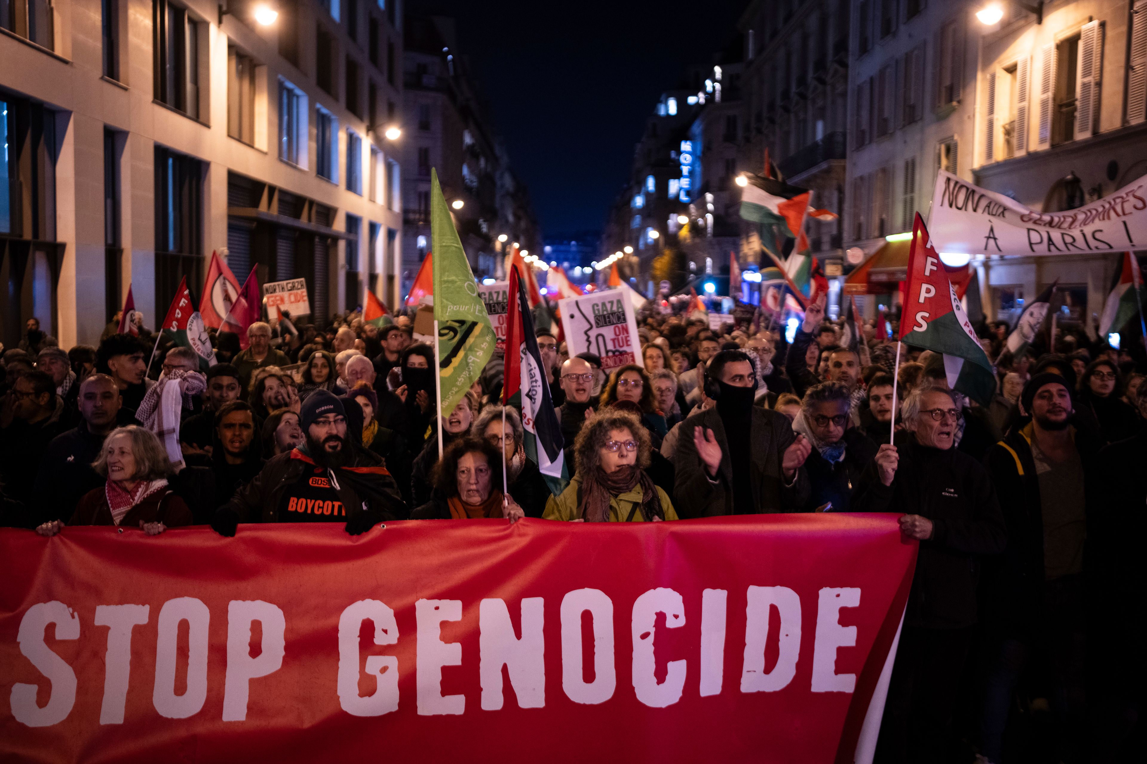 Protestors take part in a rally against the "Israel is Forever" gala organized by far-right Franco-Israeli figures, in Paris, Wednesday, Nov. 13, 2024, on the eve of the UEFA Nations League 2025 soccer match between France and Israel. (AP Photo/Louise Delmotte)