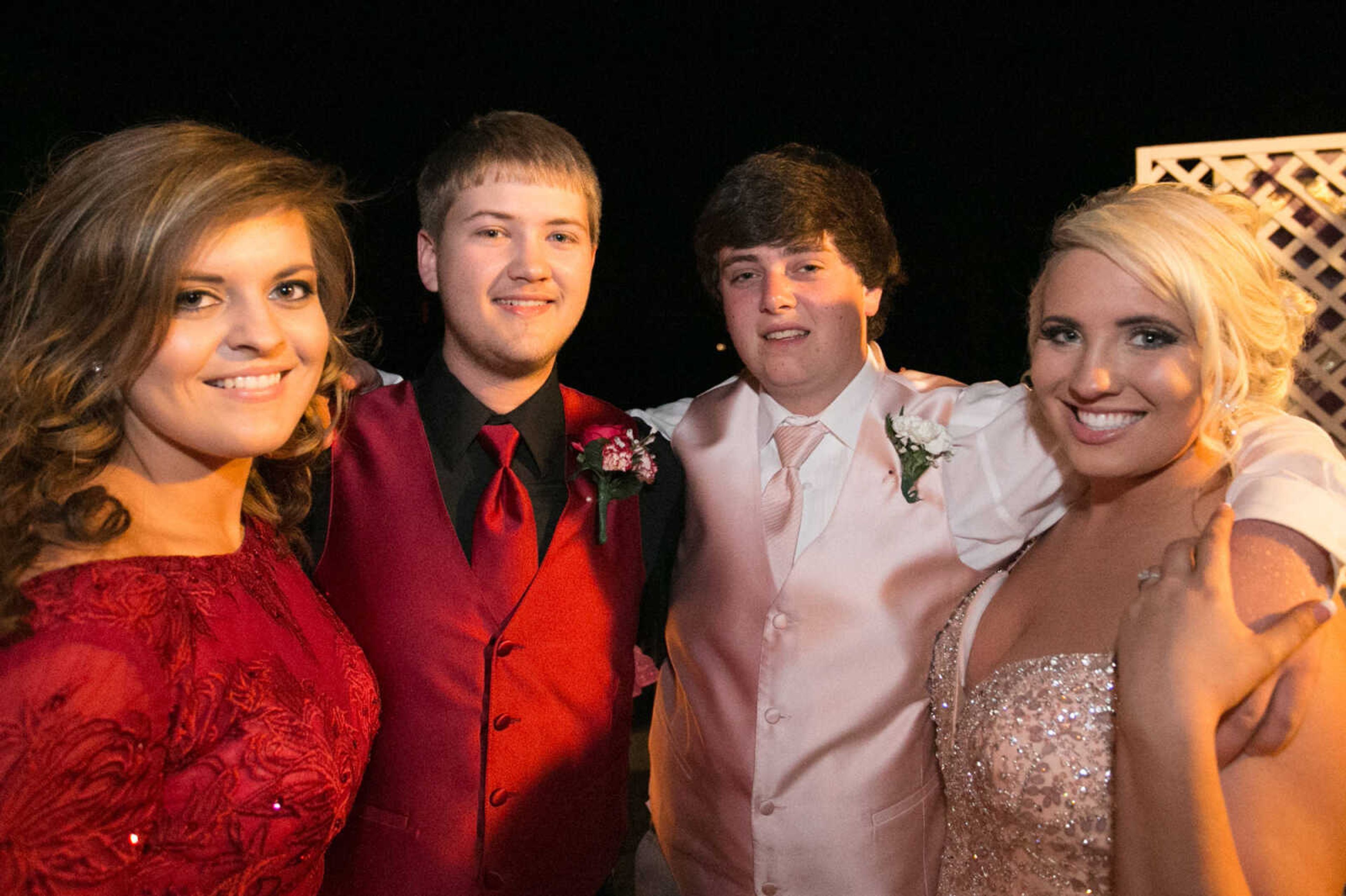 GLENN LANDBERG ~ glandberg@semissourian.com

Hannah Miller, left, Jerron Goins, Thomas Fornkohl and Audrey Birk pose for a photo during the Saxony Lutheran High School's "Classique Magnifique" prom, Saturday, April 23, 2016, at the Cape Girardeau Elks Lodge.