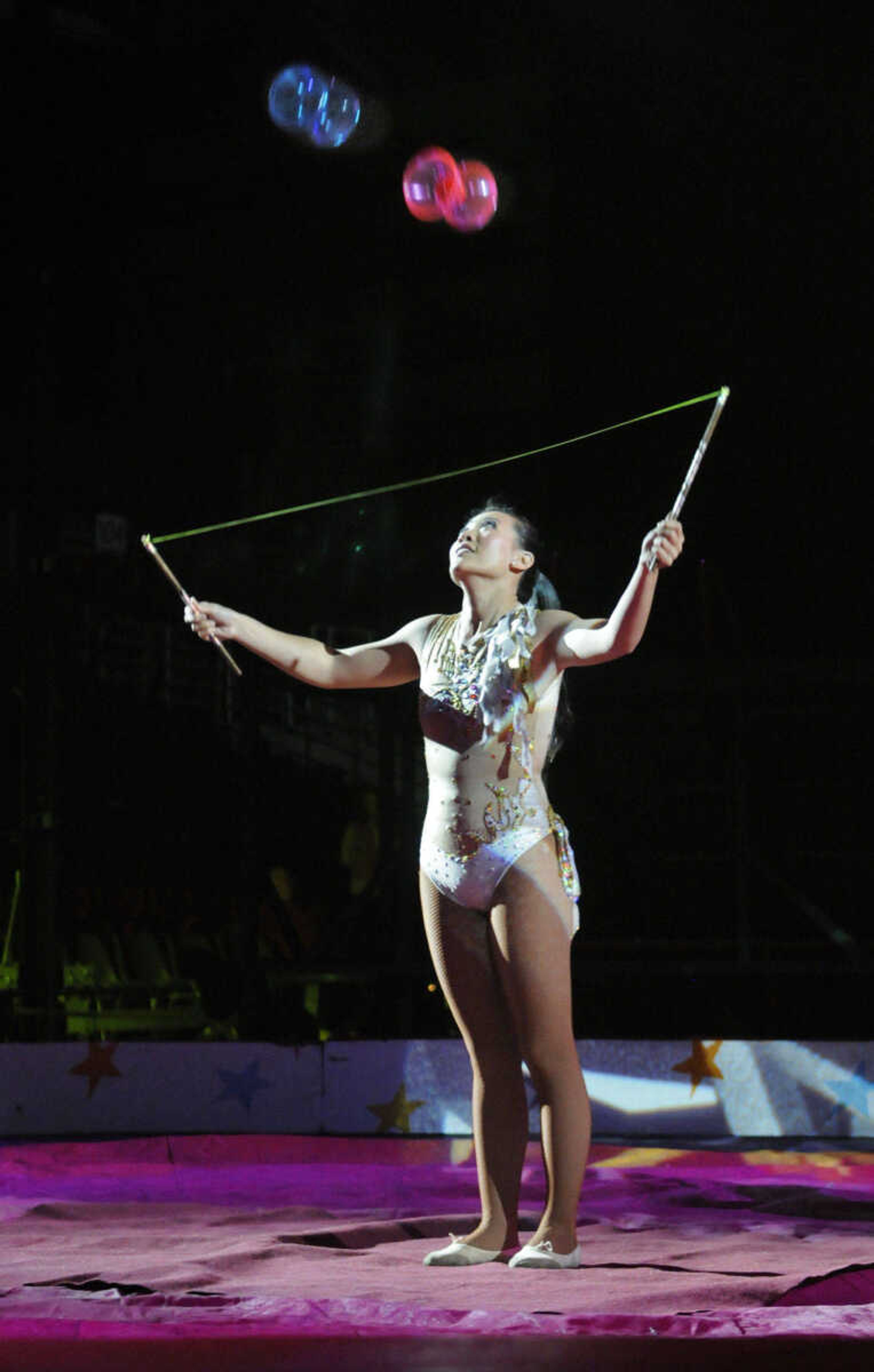 KRISTIN EBERTS ~ keberts@semissourian.com

Yu Zhen juggles two diabolos, a type of Chinese yo-yo, during the Piccadilly Circus at the Show Me Center in Cape Girardeau, Mo., on Thursday, April 29, 2010.