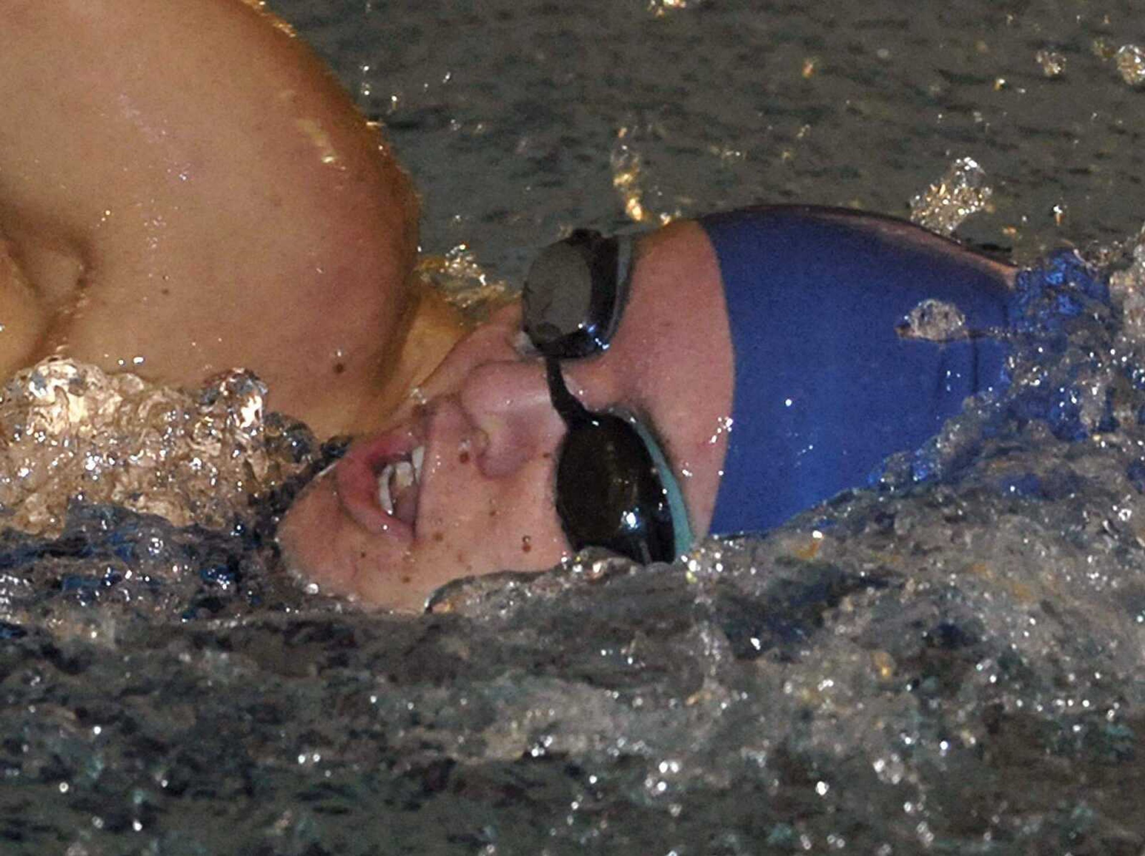 FRED LYNCH ~ flynch@semissourian.comNotre Dame's Lauren Castleman swims in the 100 freestyle during Monday's meet at the Central Municipal Pool. Castleman won the event.