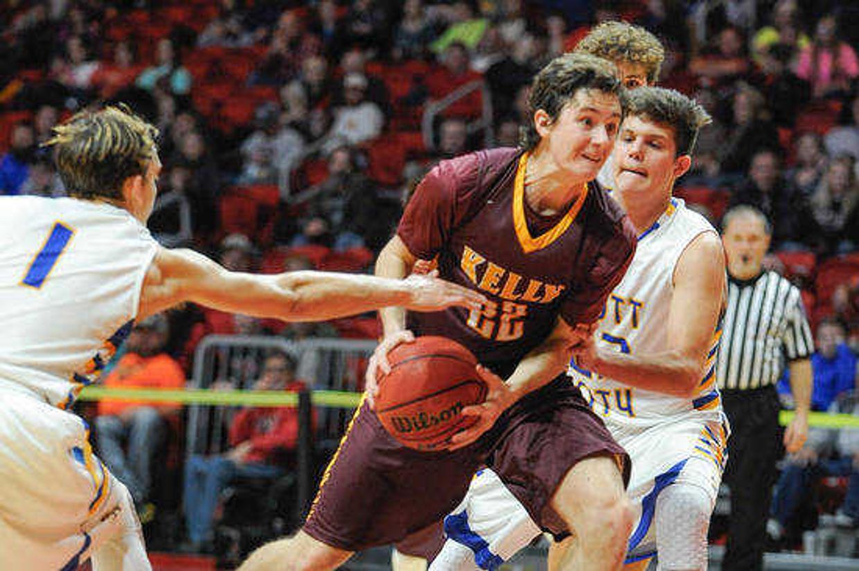 Kelly's Jake McClain pushes past Scott City defense during the second quarter in a first-round game of the Southeast Missourian Christmas Tournament Saturday, Dec. 26, 2015 at the Show Me Center. (GLENN LANDBERG)