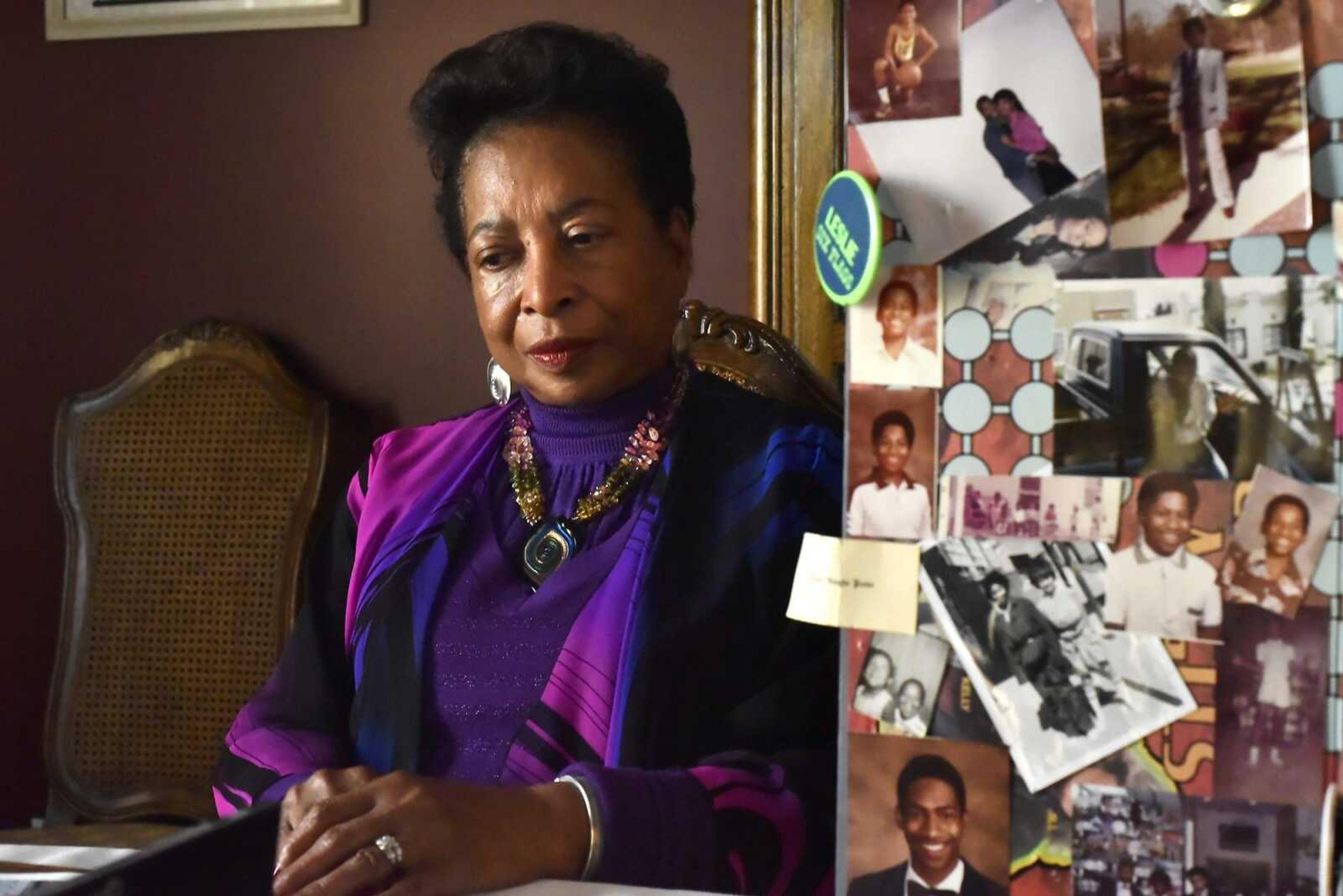 Loretta Prater sits in her Cape Girardeau home in November 2016 next to a memory board of her son Leslie. Prater's son died in police custody in Chattanooga, Tennessee, on Jan. 2, 2004.