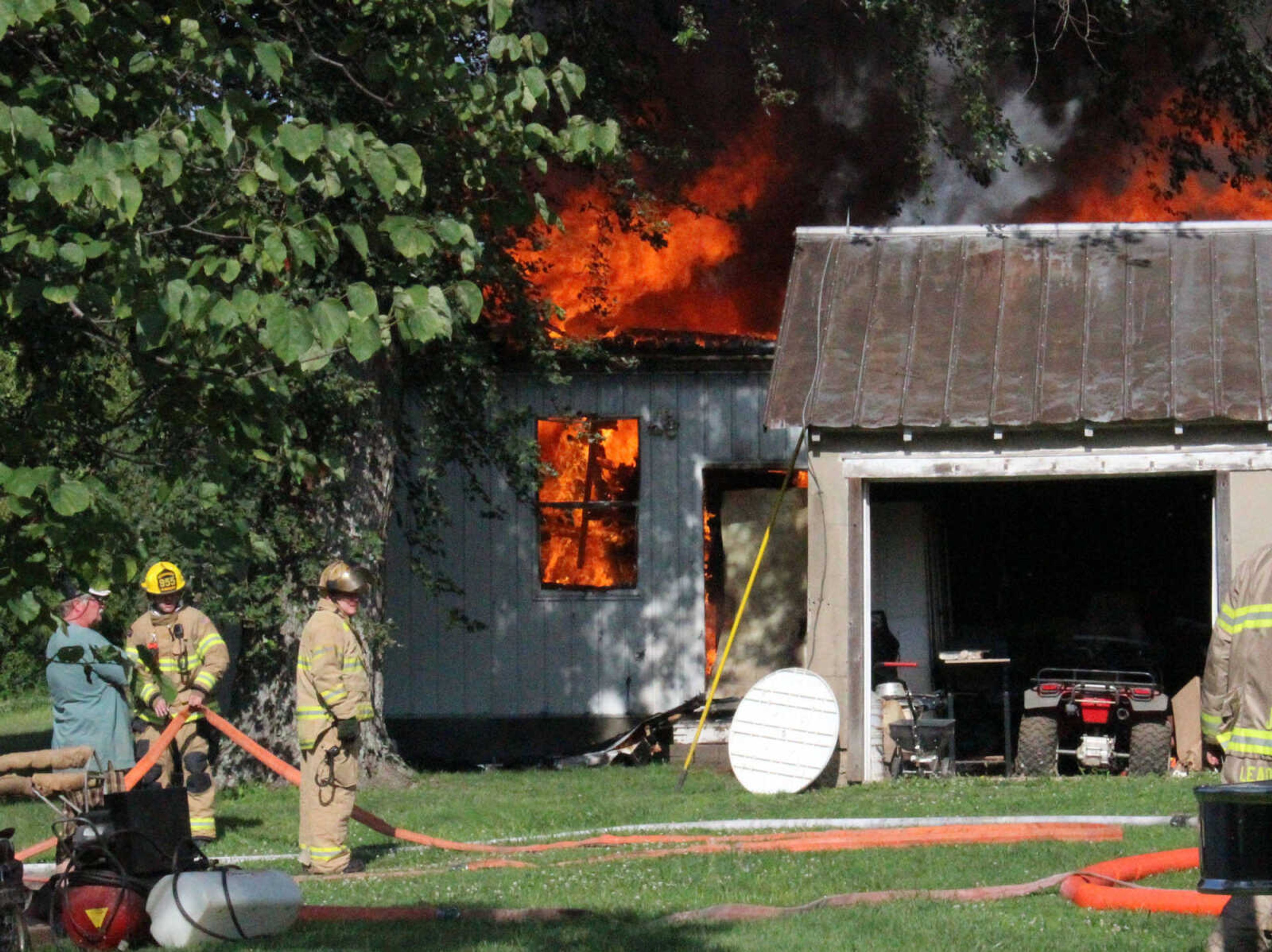 Fire departments responded to a structure fire at 373 Cape Girardeau County Road 319 Friday morning, July 25, 2014. No one was injured and damage is estimated at about $50,000, Randy Morris, chief of the Gordonville Fire Department, said. (Mark Blanton)