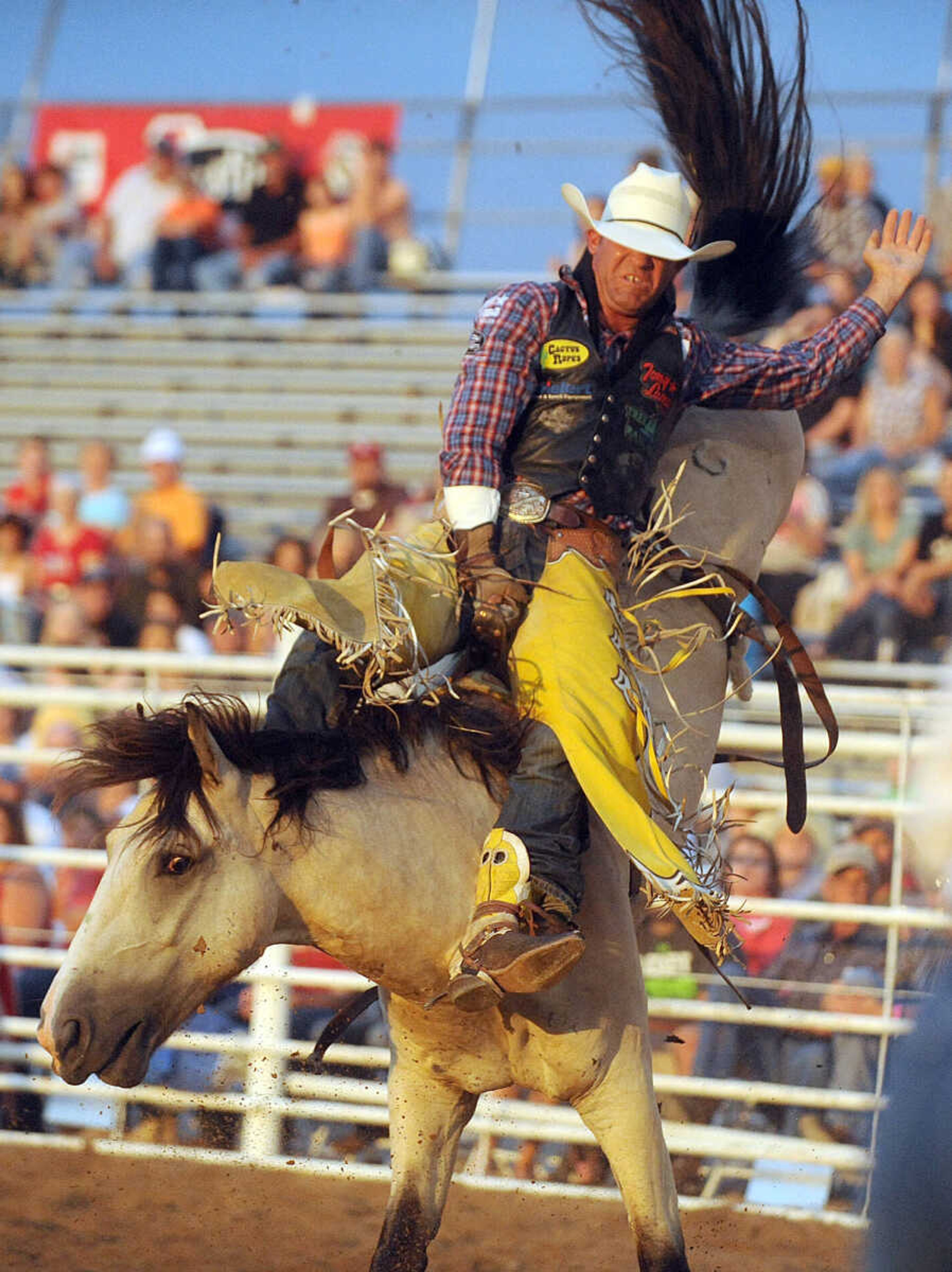 LAURA SIMON ~ lsimon@semissourian.com

Bobby Mote competes in bareback riding during the opening night of the Sikeston Jaycee Bootheel Rodeo, Wednesday, Aug. 6, 2014.