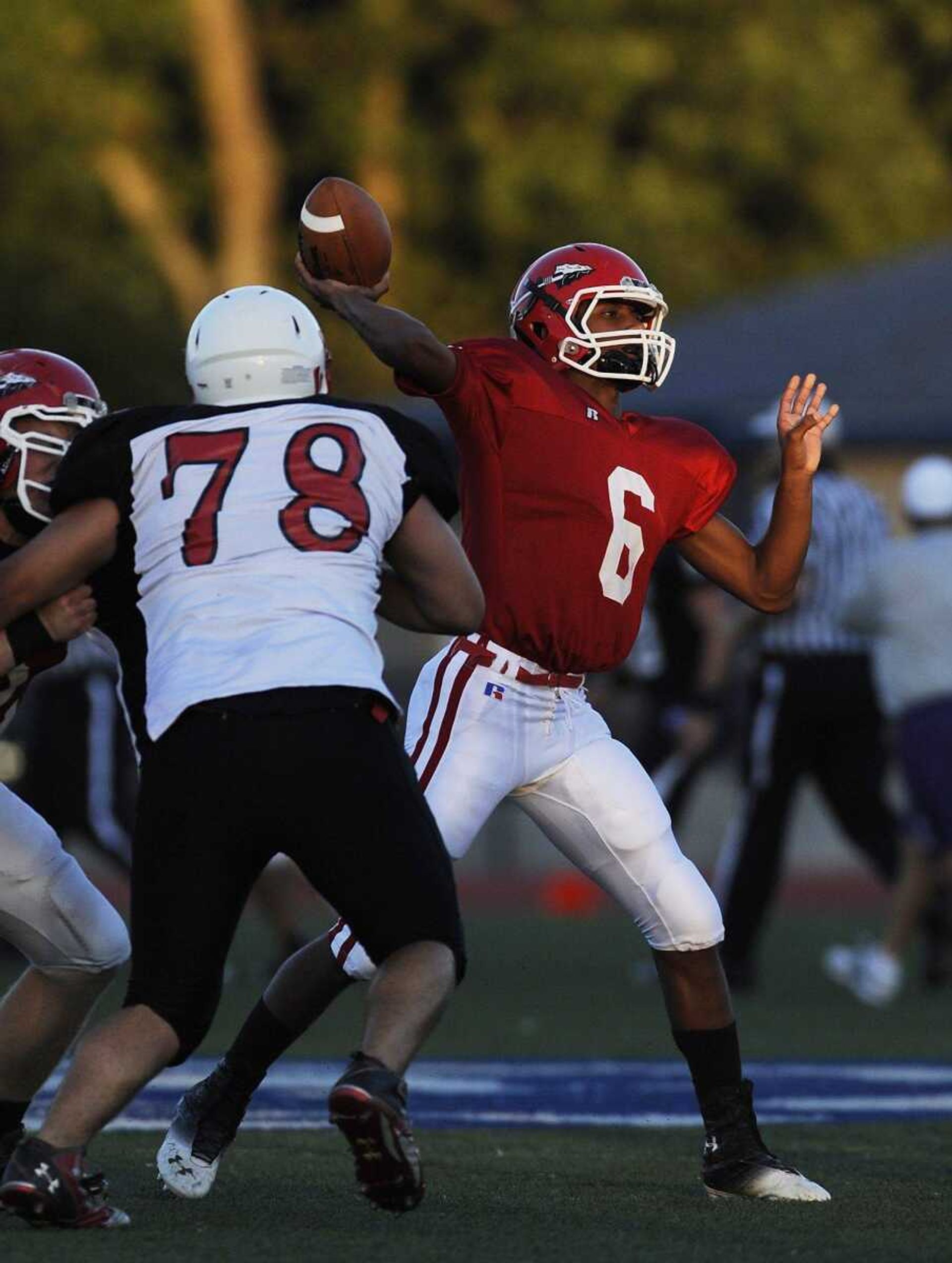 Jackson quarterback Dante Vandeven throws a pass against Fox during Friday's jamboree.