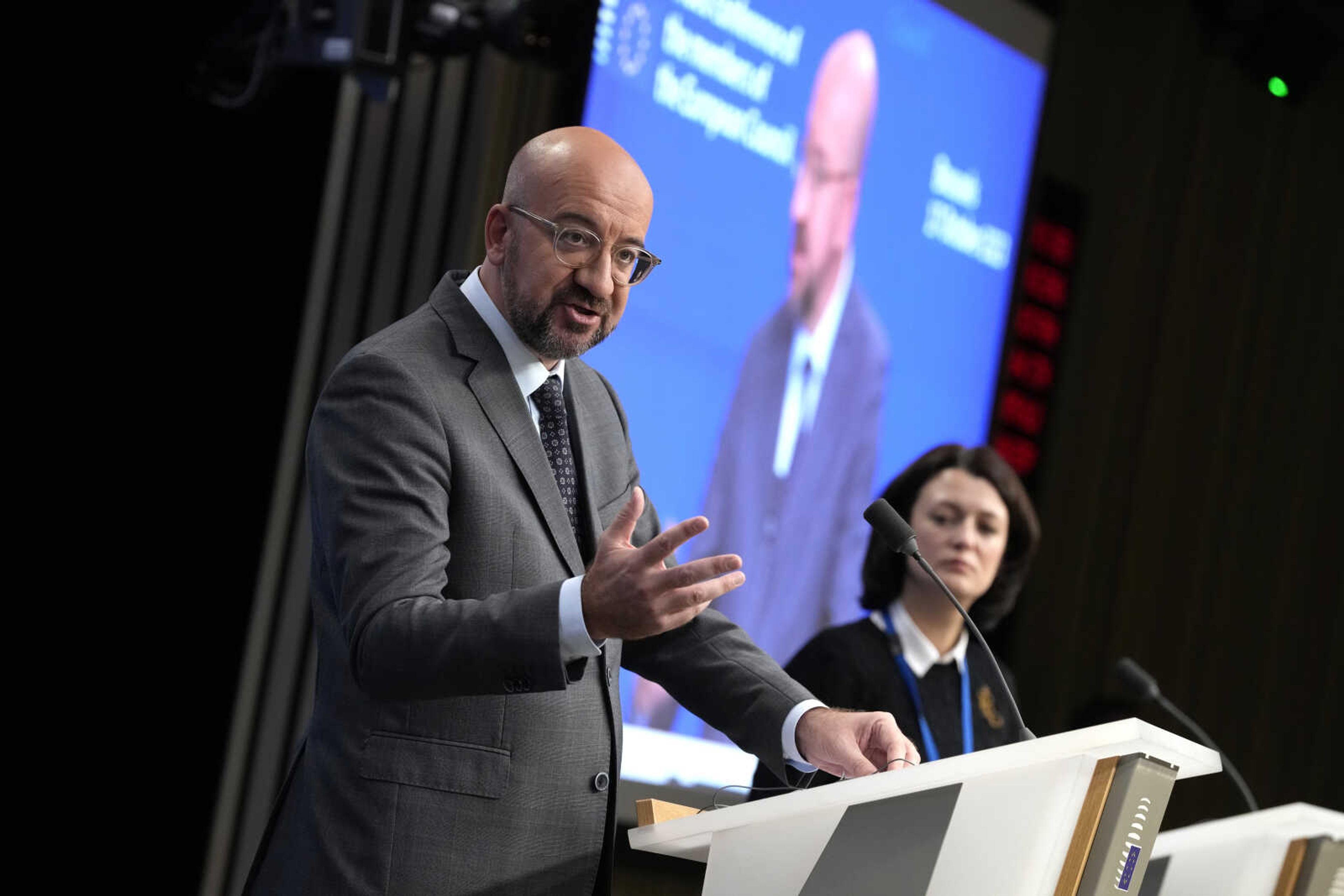 European Council President Charles Michel and European Commission President Ursula von der Leyen, via video, address a media conference after an EU summit in virtual format at the European Council building in Brussels, Tuesday, Oct. 17, 2023. European Union leaders are holding a virtual summit to try to overcome different opinions and voices over the Israel-Hamas war and have a bigger diplomatic impact on the global stage. (AP Photo/Virginia Mayo)