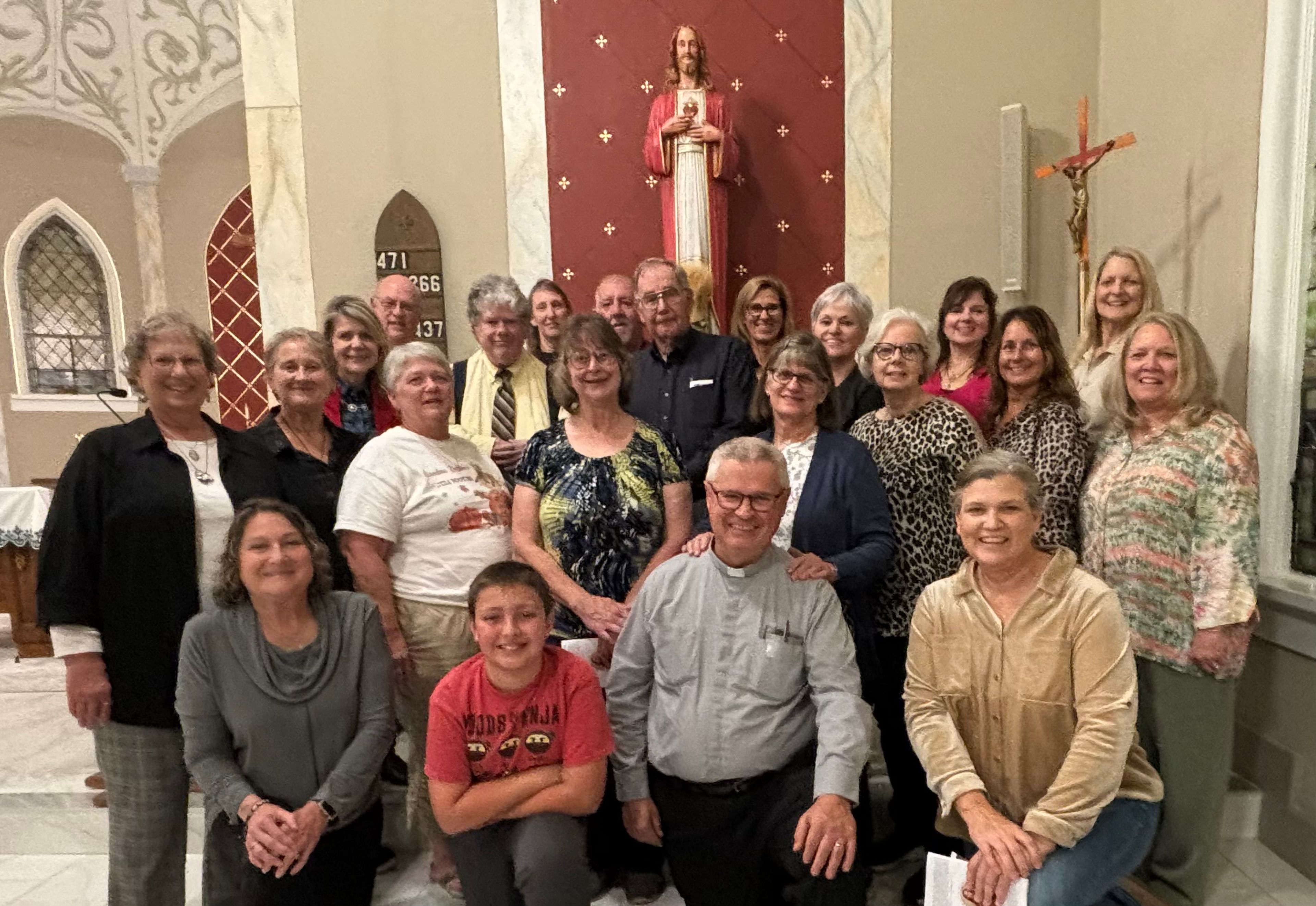 At the final stop on the Sacred Heart pilgrimage in Caruthersville, Missouri, the pilgrims gathered for one more group picture. Pictured left to right are: front row-Sue Wibbenmeyer, Isaac Bremer, Deacon Al Stoverink, & Tammi Asmus. Second row-Doris Eftink, Polly Mungle, Debbie Gaines, Joyce Luten, Carol Stoverink, Darlene Margrabe, Carla Glaus, & Milissa Eggimann. Third row-Ann Yuede, David Coe, Joe Sander, Jill Pinkston, Ruth Ann Hester, & Jane Oehl. Back row-David Eftink, Stephanie & Curtis Weidenbenner, & Tammy Bean.

