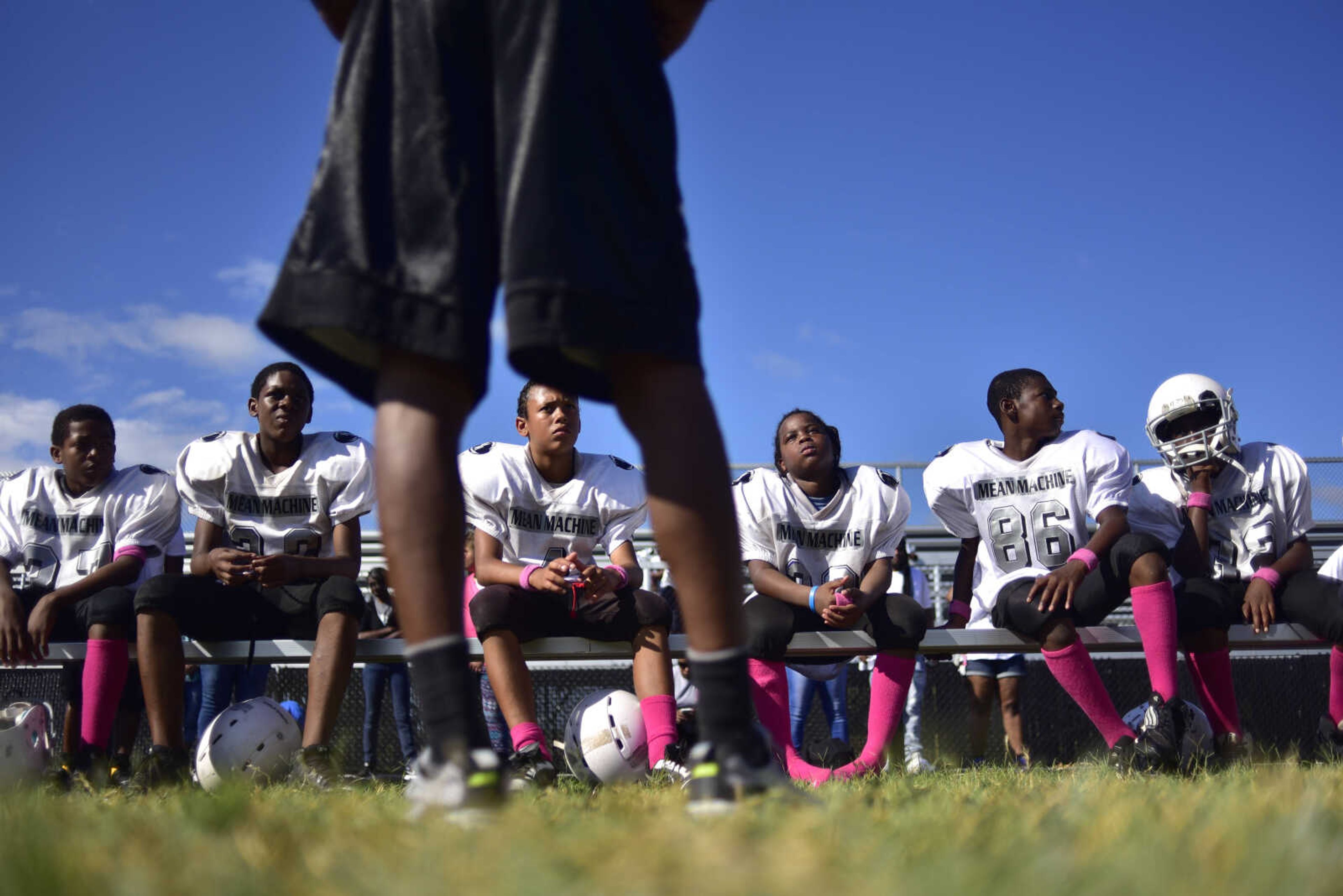 Coach Foster talks with his team in disappointment after a loss against the Farmington Renegades Sunday, Oct. 8 ,2017.