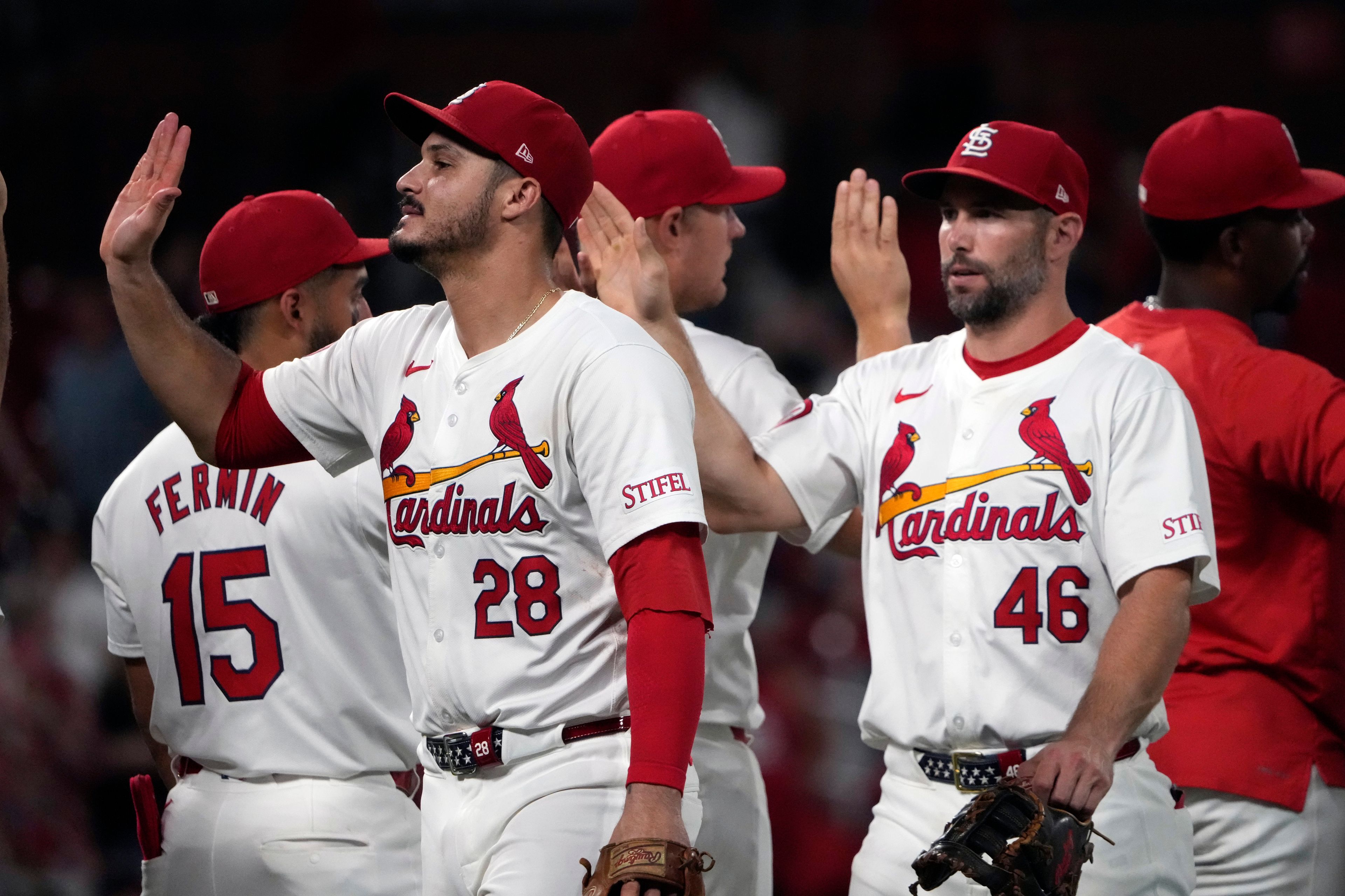 St. Louis Cardinals' Nolan Arenado (28) and Paul Goldschmidt (46) celebrate a 4-0 victory over the Pittsburgh Pirates following a baseball game Monday, Sept. 16, 2024, in St. Louis. (AP Photo/Jeff Roberson)