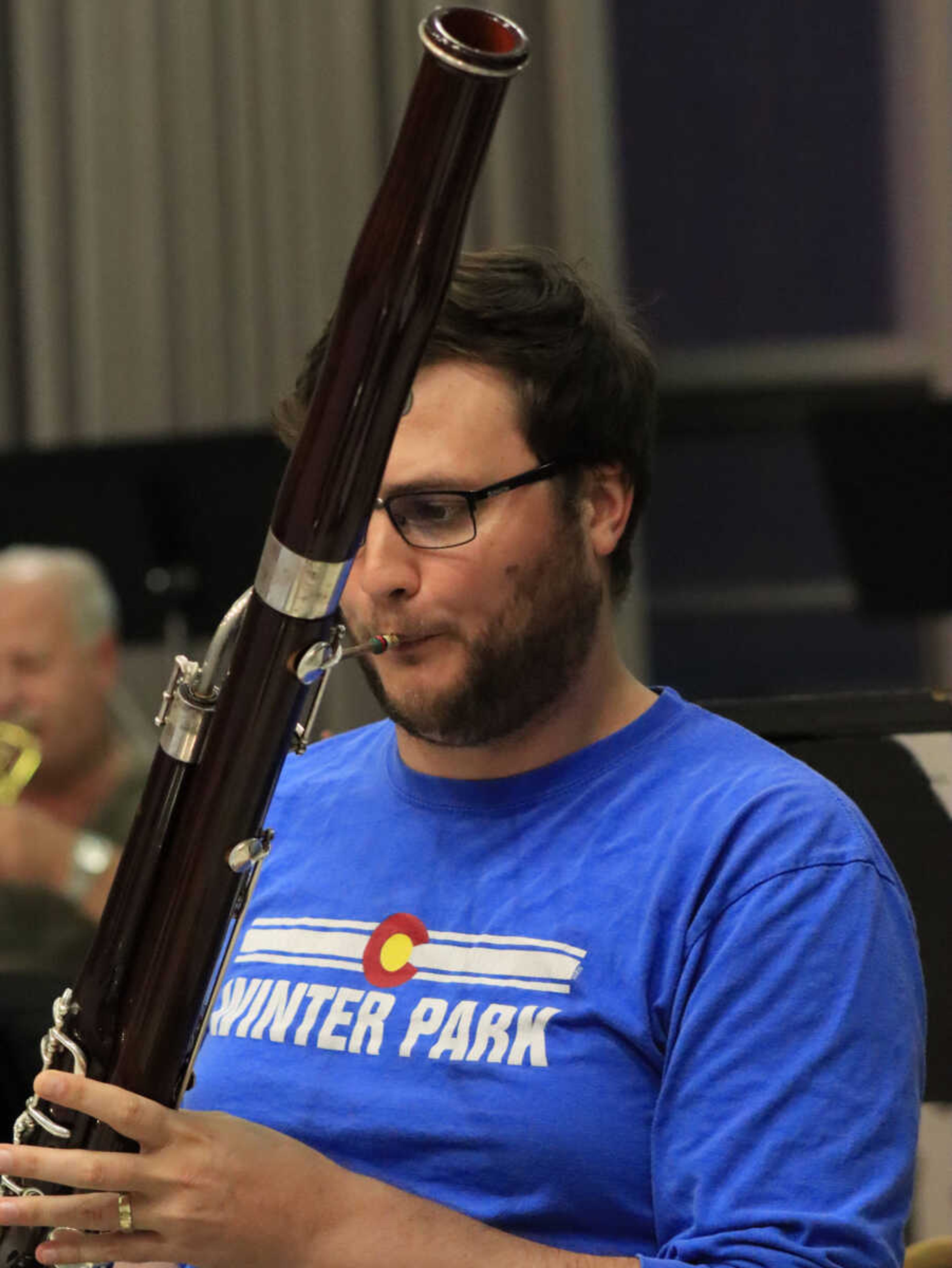 Eric Koenig follows intently along with the music while playing the bassoon on Tuesday.