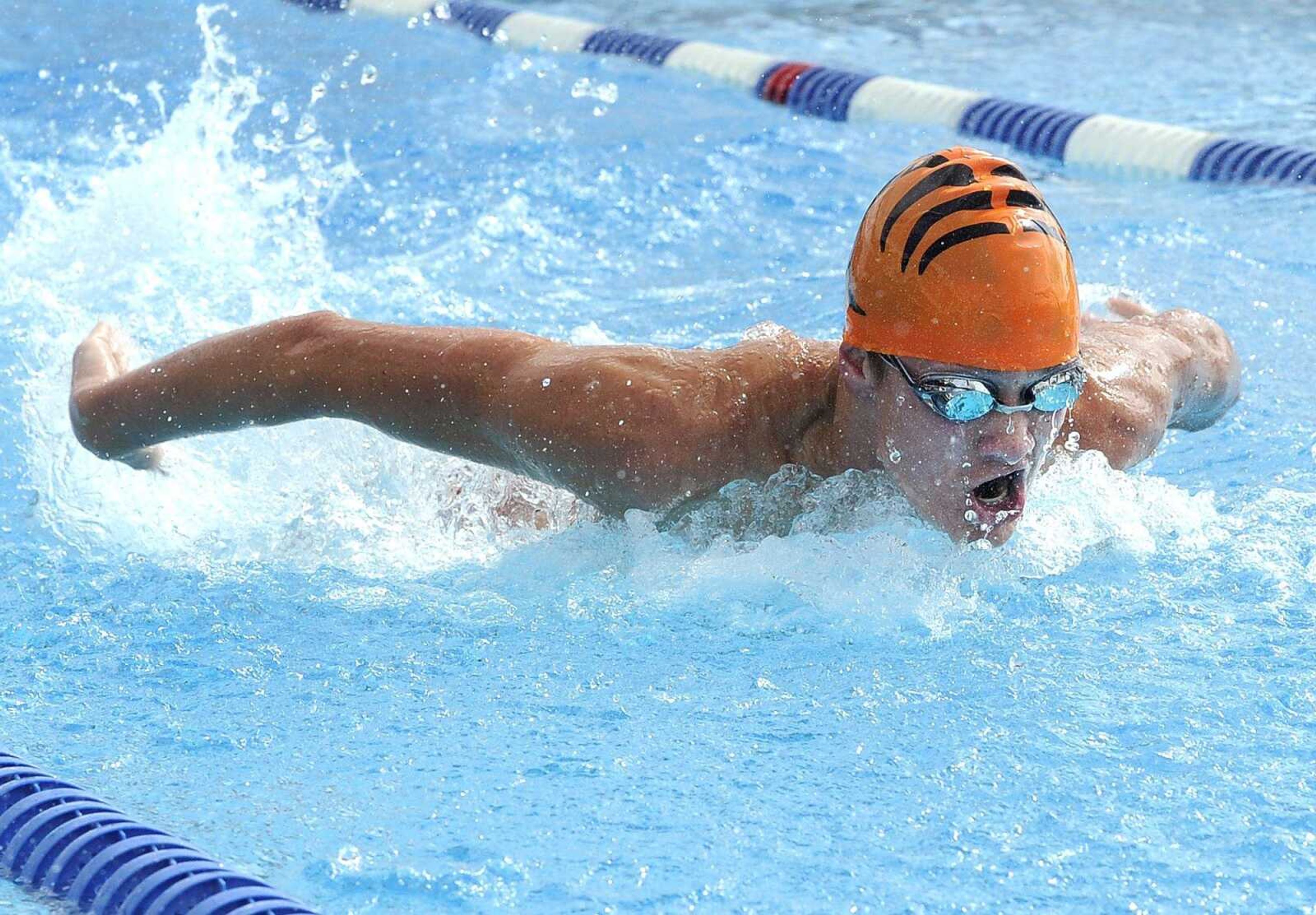 Cape Girardeau Central's Truman Vines swims in the 200 medley relay Tuesday at Central Municipal Pool. Central won the event in a state-qualifying time of 1 minute, 45.47 seconds. The Tigers also won the four-team meet.