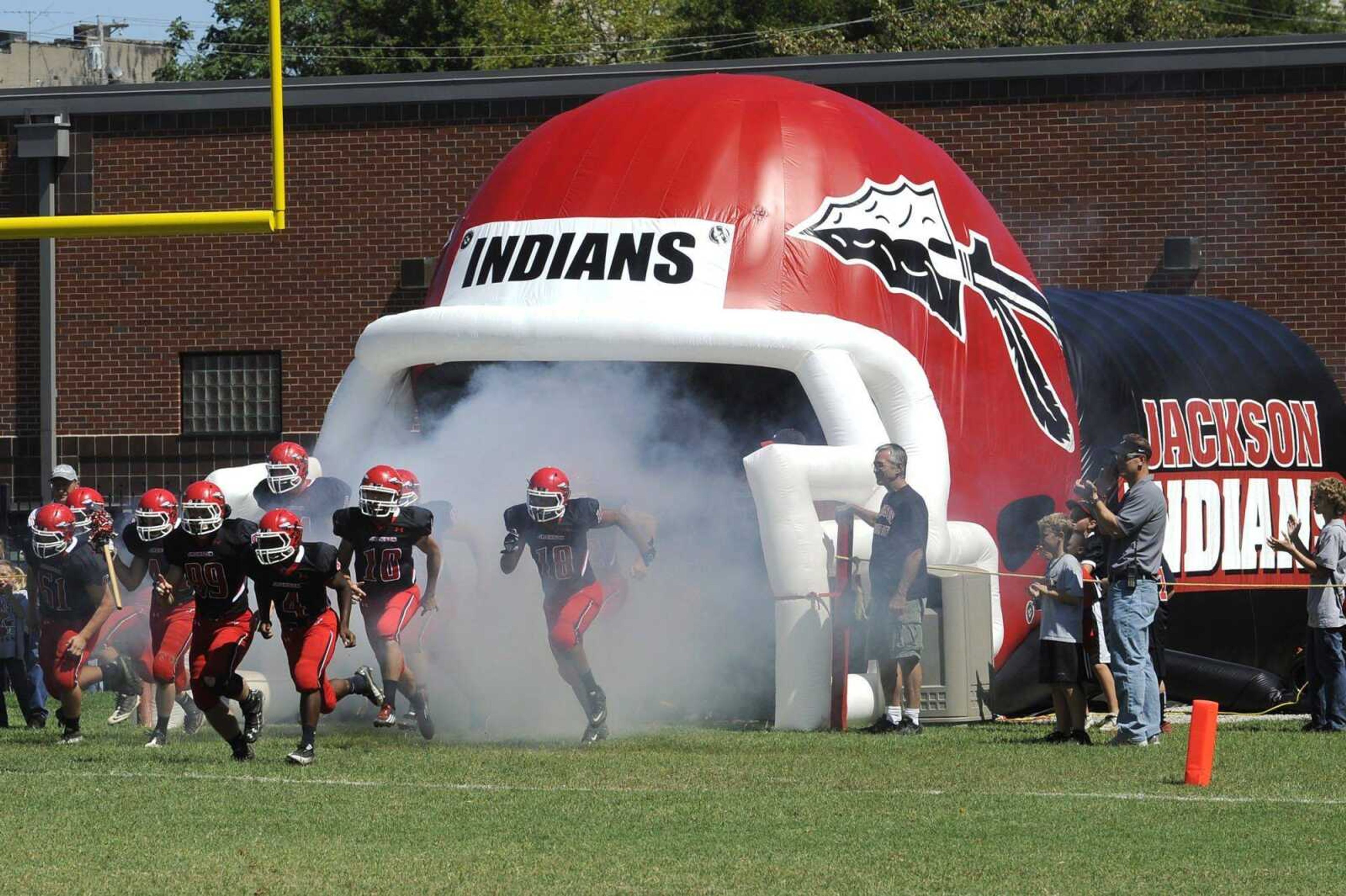 The Jackson football team takes the field for the game with Farmington Saturday, Sept. 8, 2012 at Jackson High School. (Fred Lynch)