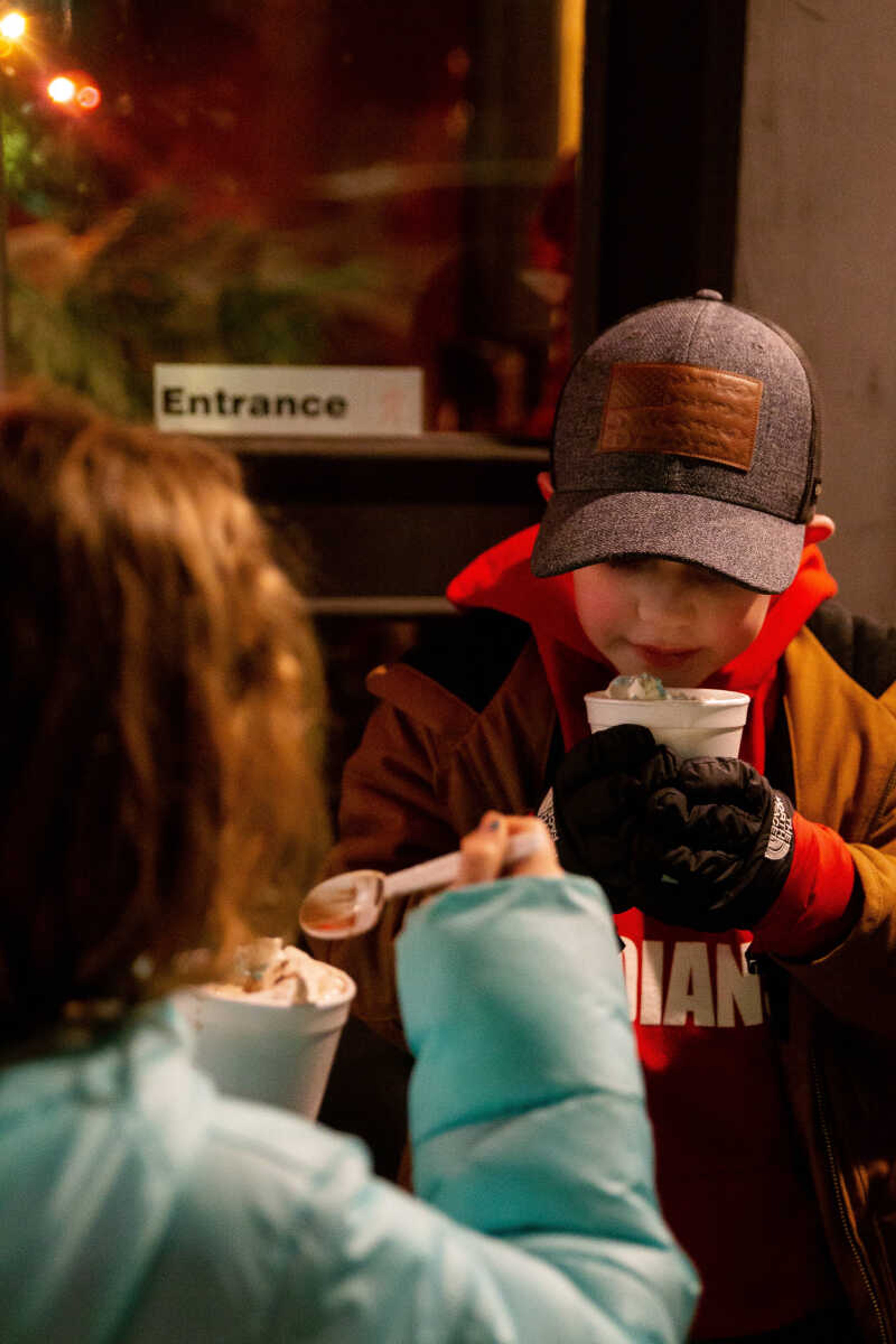 &nbsp;Emmett&nbsp;Pinkerton and Bella Gore, both 7, drink hot chocolate&nbsp;on Friday, Dec. 2 in downtown Cape Girardeau.