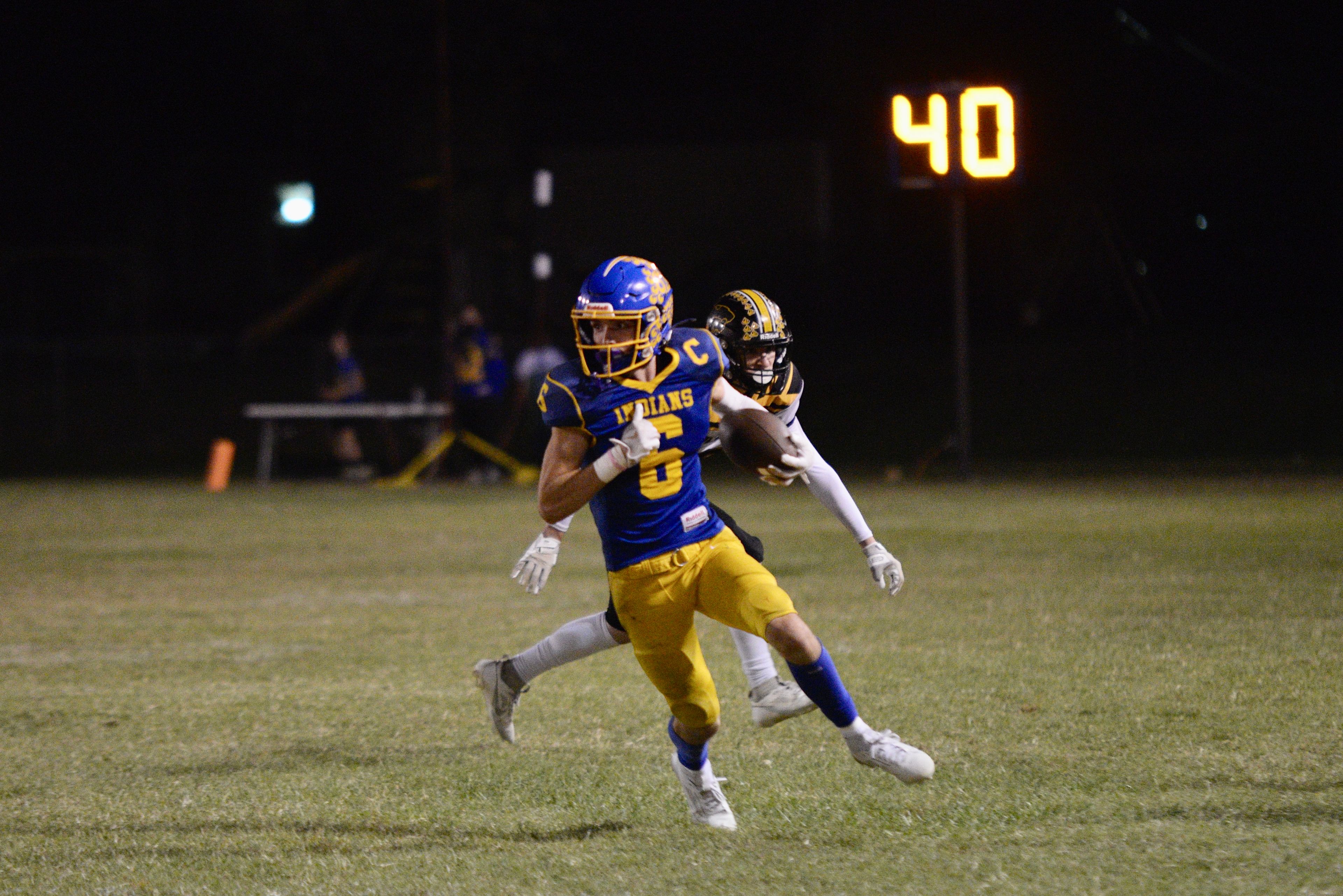 St. Vincent’s Clayton Gremaud runs past a Cuba defender on Friday, Oct. 11, in Perryville. 