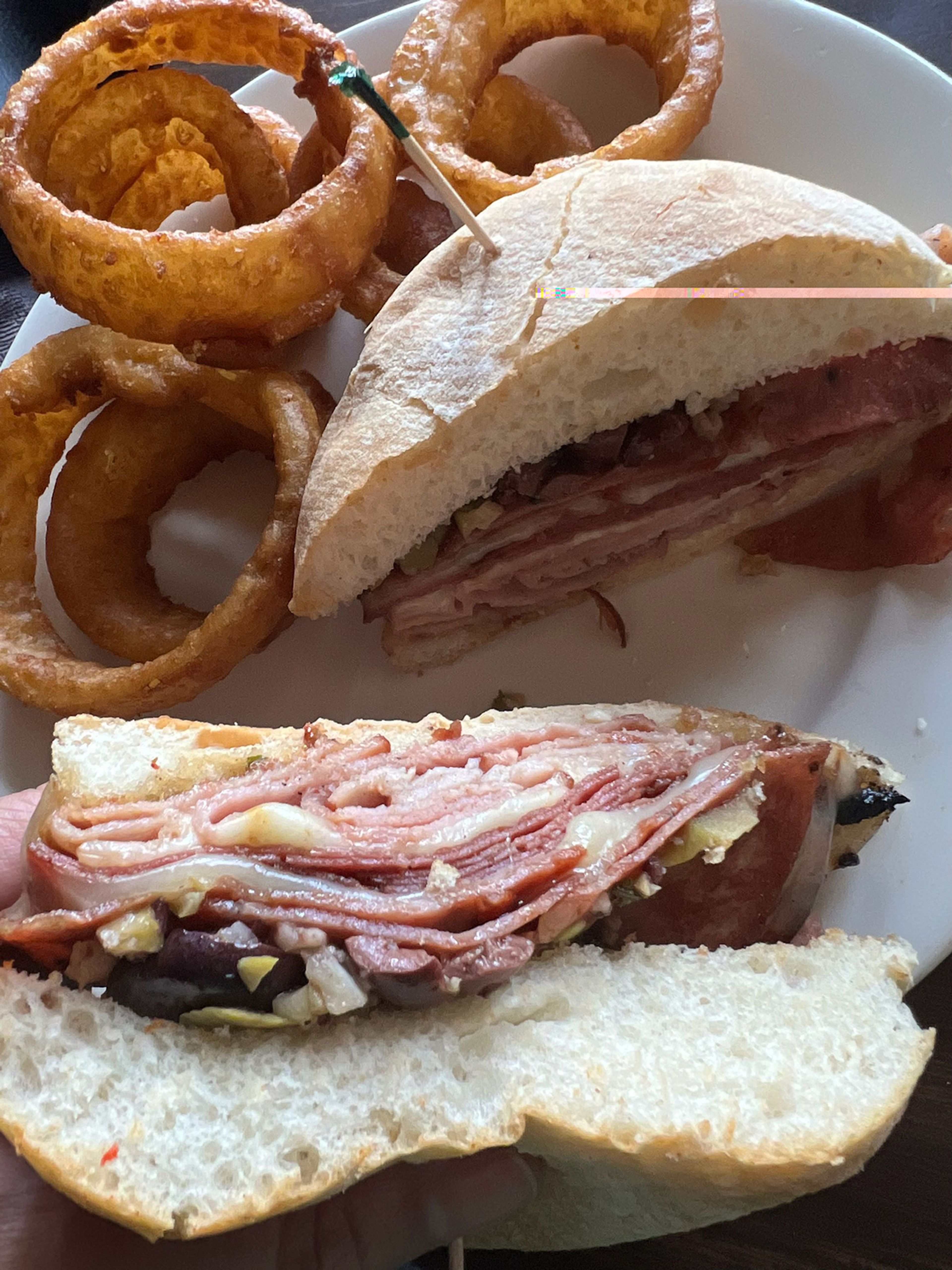 Whether you've never had a muffaletta or you're craving a taste of NOLA, Port Cape's version with real mortadella is sure to exceed your expectations. 