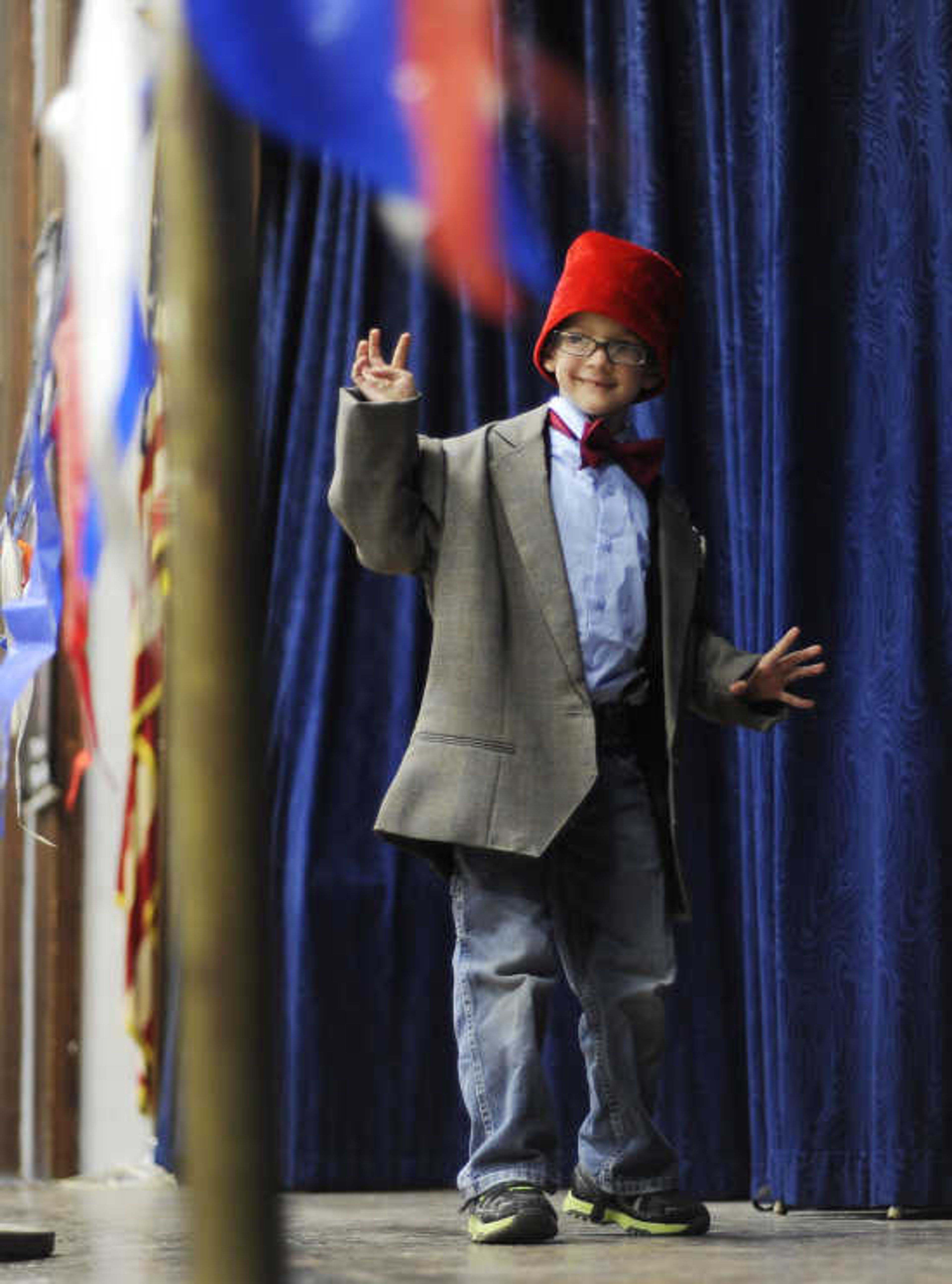 James Deves, 7, takes the stage dressed as The Doctor from the long-running BBC science fiction series "Dr. Who" for the costume contest at the 2013 Cape Comic Con Saturday, April 20, at the Arena Building in Cape Girardeau. 