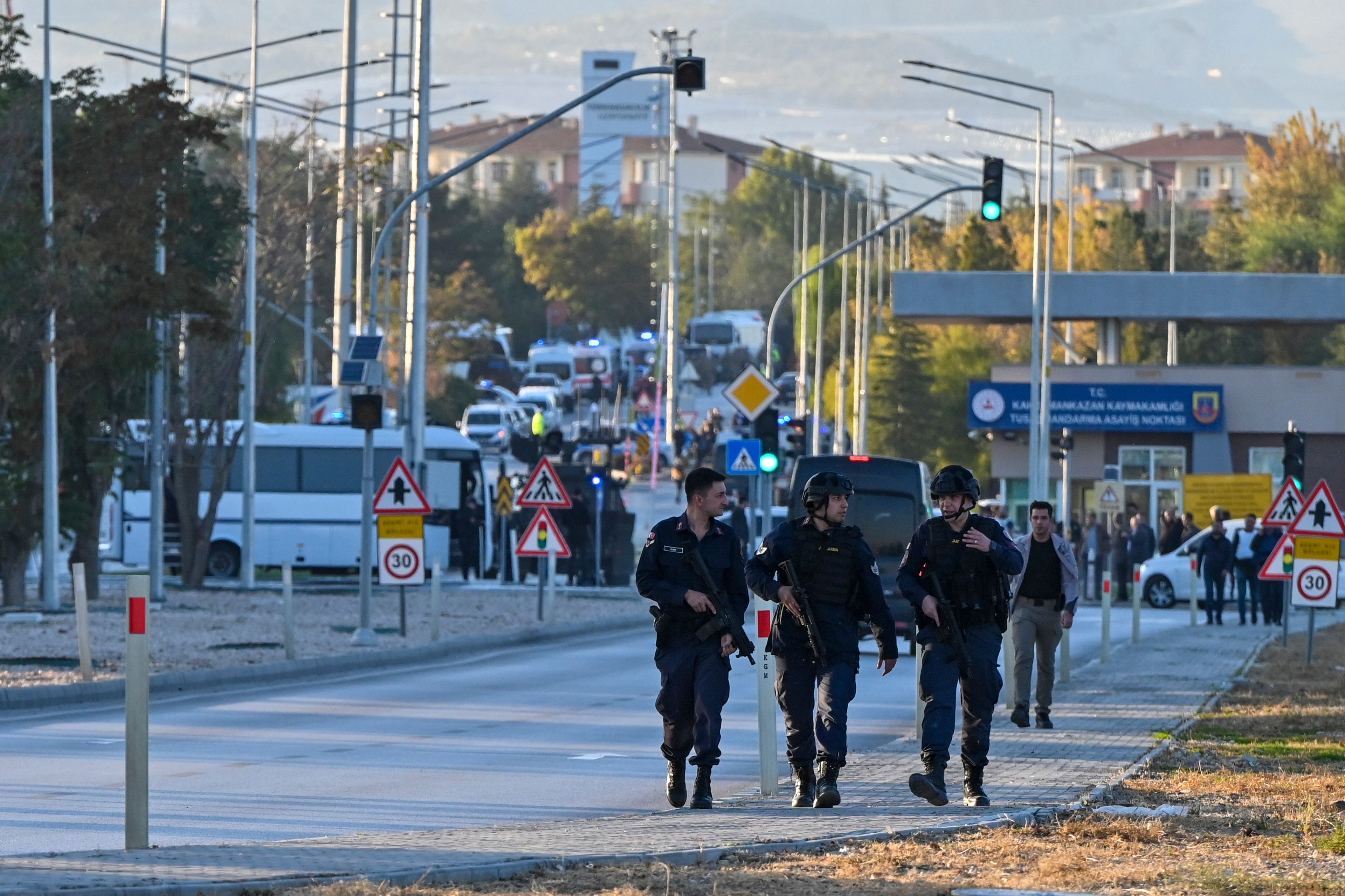 Emergency and security teams are deployed outside of Turkish Aerospace Industries Inc. at the outskirts of Ankara, Turkey, Wednesday, Oct. 23, 2024. (AP Photo)