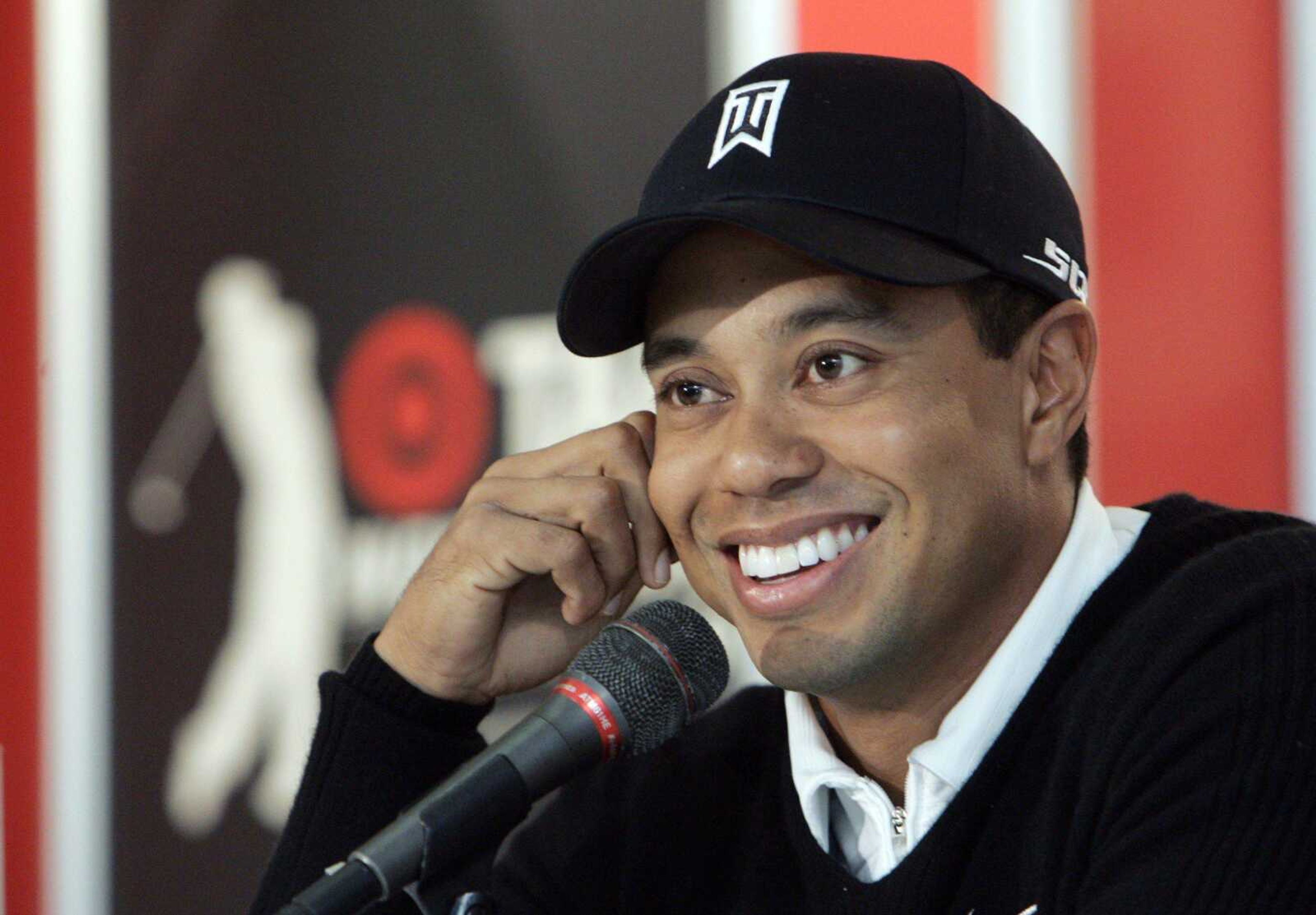 Tiger Woods discussed being named PGA Player Of The Year and other topics at a news conference before the start of the Target World Challenge tournament, which he will host this week at Sherwood Country Club in Thousand Oaks, Calif. (REED SAXON ~ Associated Press)