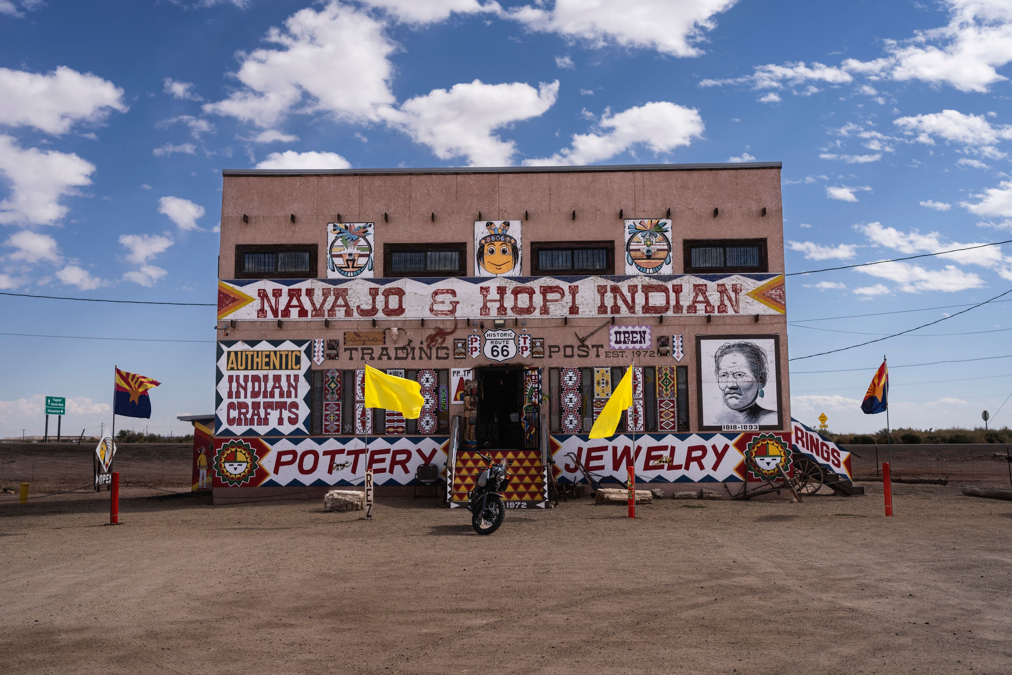 Navajo and Hopi arts and crafts are promoted on the facade of a storefront, in Winslow, Ariz., Tuesday, Oct. 15, 2024. (AP Photo/Rodrigo Abd)